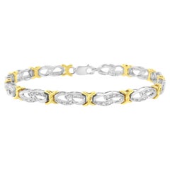 Bracelet à maillons « Infinity and X » en argent plaqué jaune 10 carats et diamants 1/4 carat