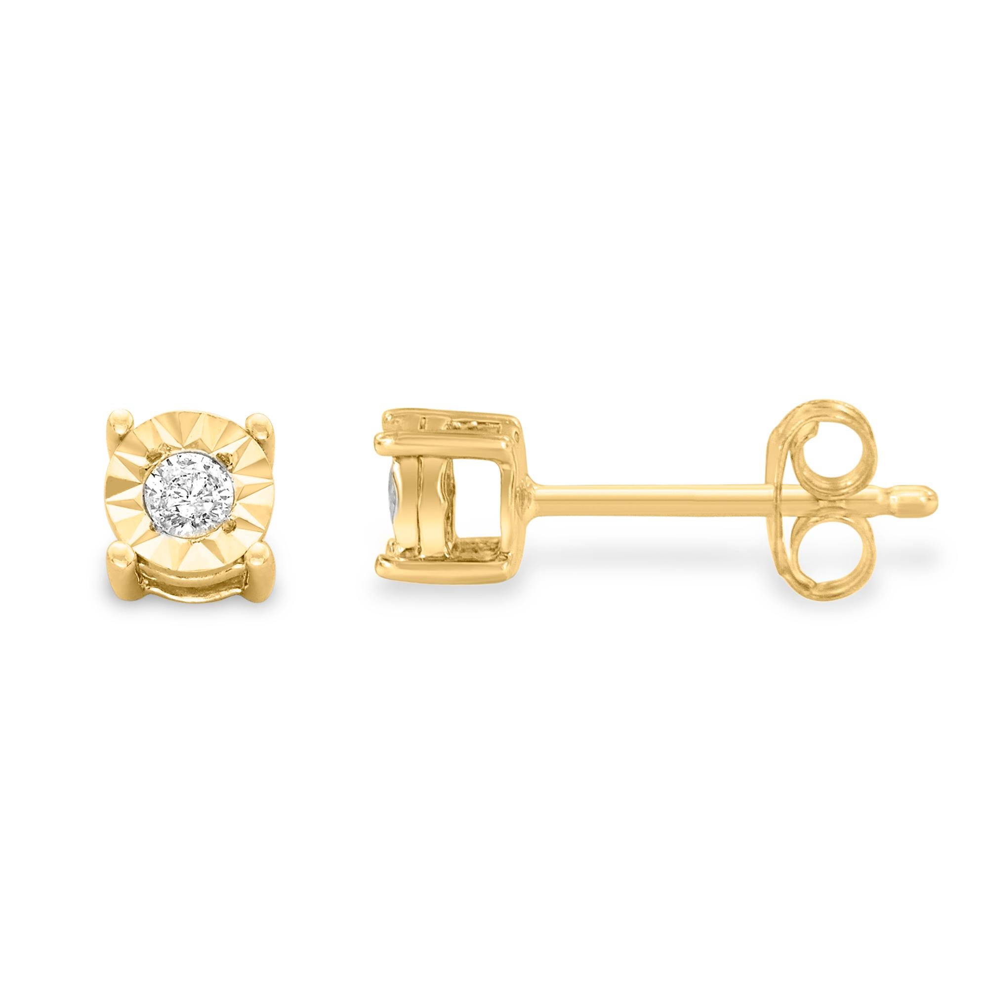 Add a shimmering touch to your wardrobe with these elegant and extravagant diamond earrings. Fashioned in the round shape, the earrings are crafted of sterling silver and have a yellow gold plating of 10 karats. Each of the studs captivates