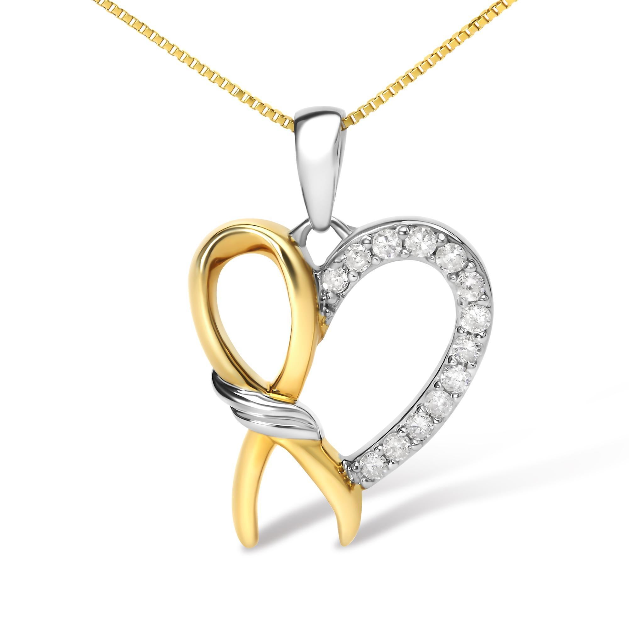 Questa collana con ciondolo a forma di cuore è un inno all'amore e al lusso. Realizzato in argento 925 placcato oro giallo 10K, irradia eleganza e fascino. Impreziosito da 13 diamanti rotondi naturali per un totale di 1/5 di carato, il pendente ha