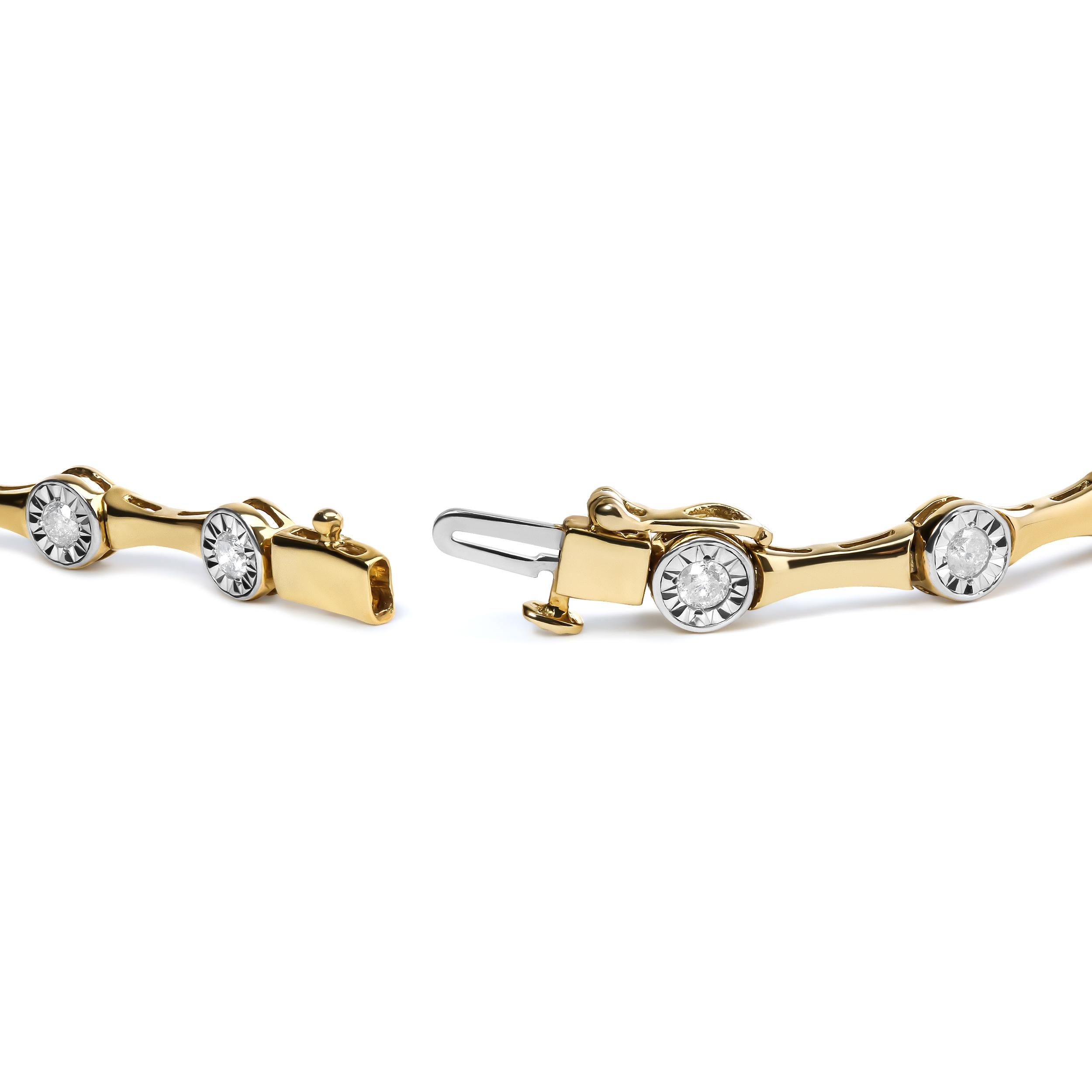 Adorn your wrist with the dazzling sparkle of diamonds. Crafted with care and precision, this bracelet is a true treasure. Plated with 10K yellow gold, the .925 sterling silver base shines with a warm, radiant glow. The round cut diamonds, with a