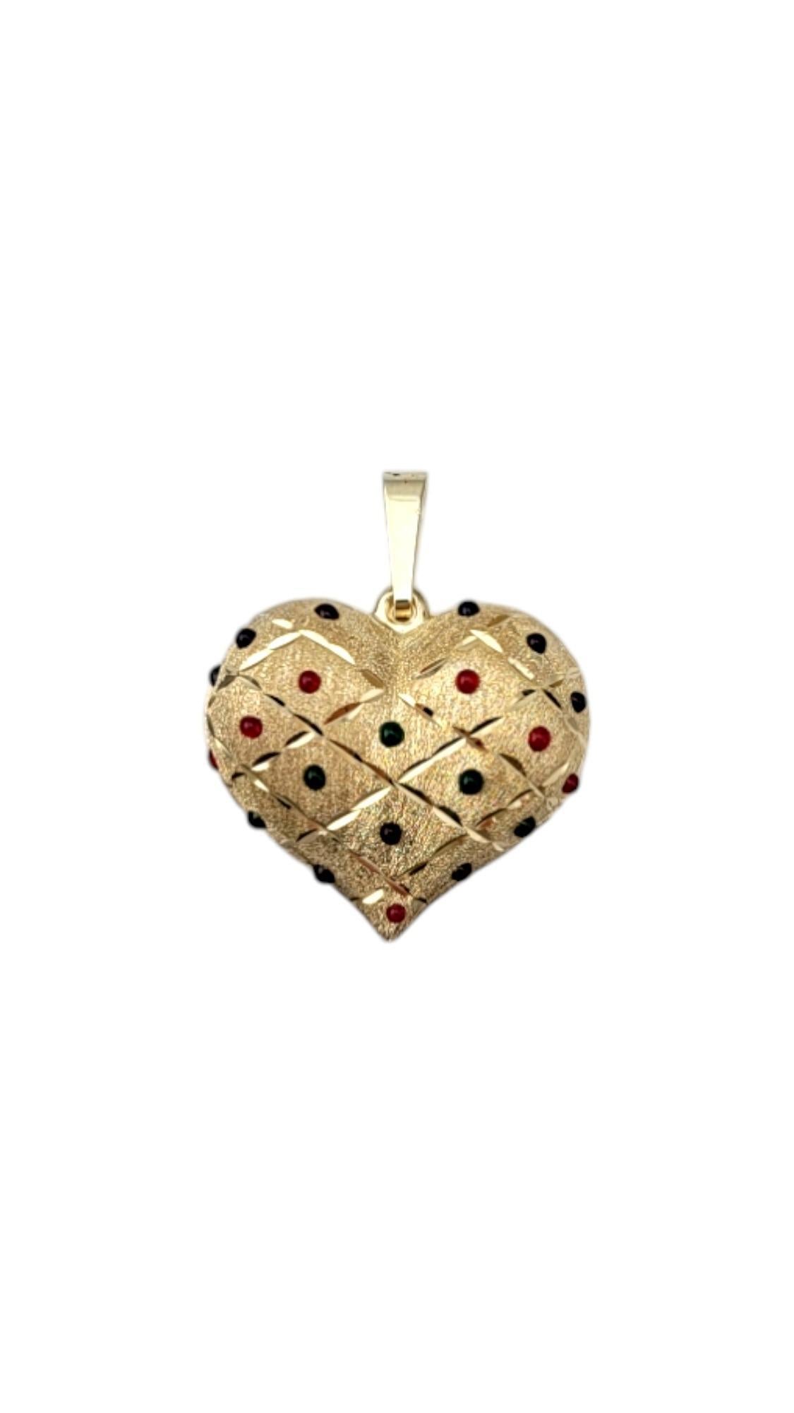 10K Yellow Gold Heart Pendant with Enamel Dots #20321 -

This 10k yellow gold heart pendant is delicately adorned with colorful enamel dots, adding a playful and vibrant touch to its classic design, and makes a delightful addition to any jewelry