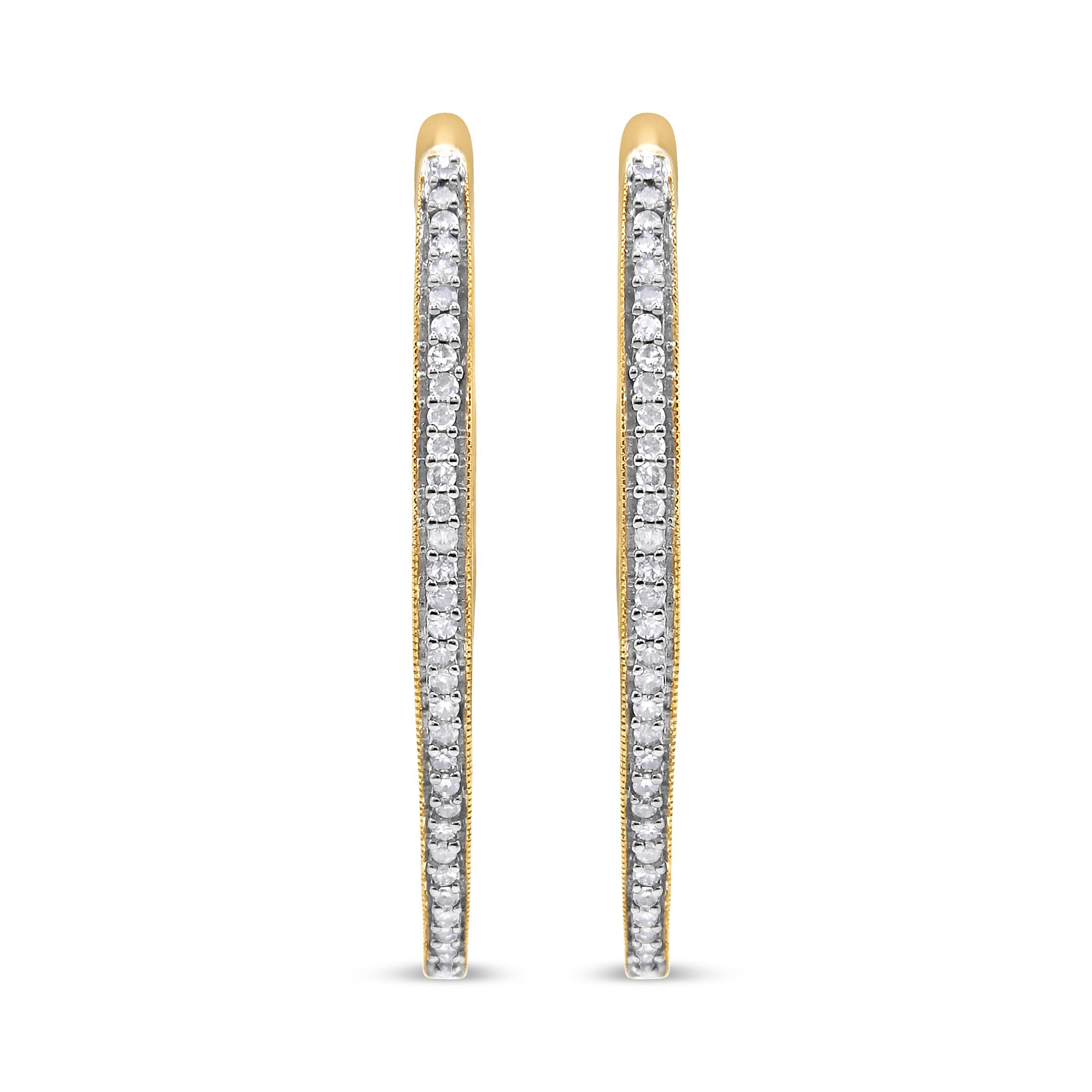 These glamorous 10k yellow gold hoop earrings showcase 1ct of round cut diamonds. The prong set diamonds inlay half the inside and outside of the hoops giving them maximum sparkle. These inside out hoop earrings are the perfect gift for that trendy,