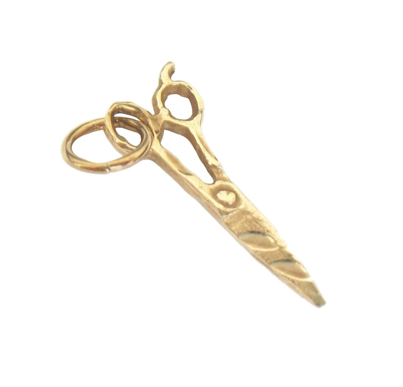 10K solid yellow gold 'scissors' charm - signed (AKB - ARMANDOR) - Canada - late 20th century.

Excellent pre-owned condition - un-soldered bail - no loss - no damage - no repairs - minor signs of use. 

Size/Dimensions - 3/4