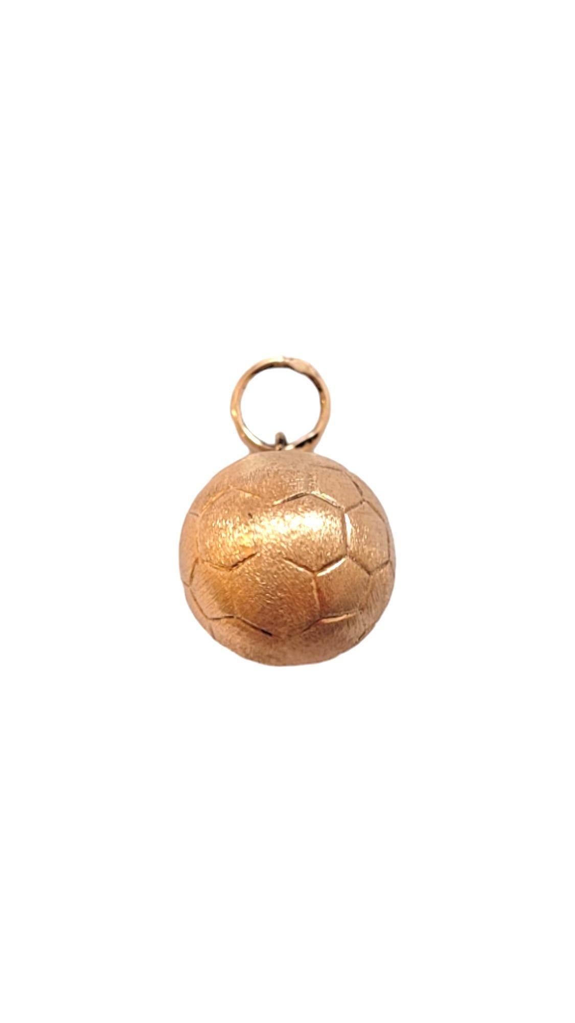 10K Yellow Gold Soccer Ball Charm- 

This adorable soccer ball charm is crafted in beautifully detailed 10K yellow gold and is a perfect piece for any lover of the game. 

Size: 19.3mm X 12.0 mm X 12.0 mm

Weight: 0.4dwt/ 0.7 g

Hallmark: 10K

Very