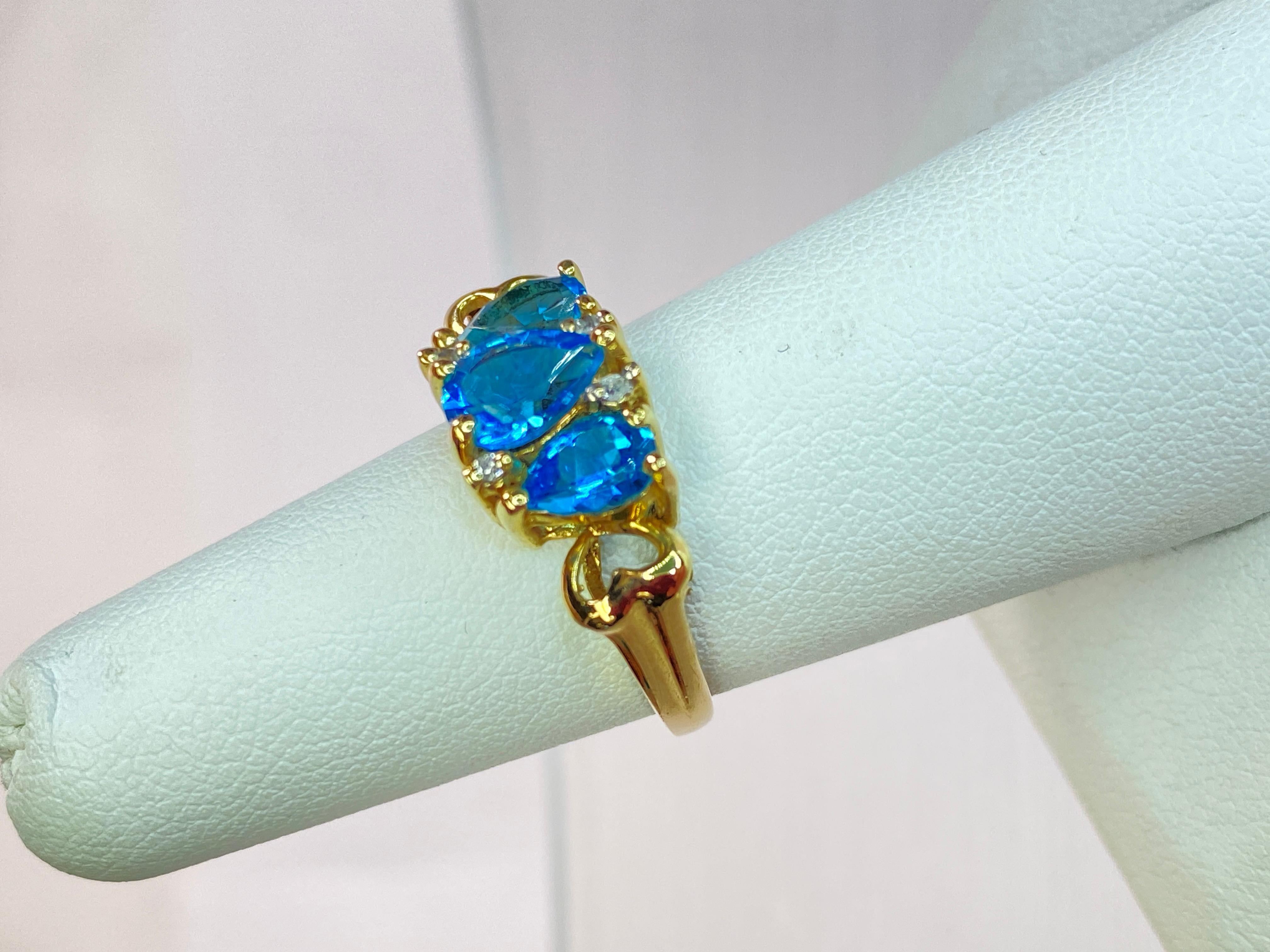 Women's 10K Yellow Gold Swiss Blue Topaz White Sapphire 3 Stone Anniversary Ring Size 6 For Sale