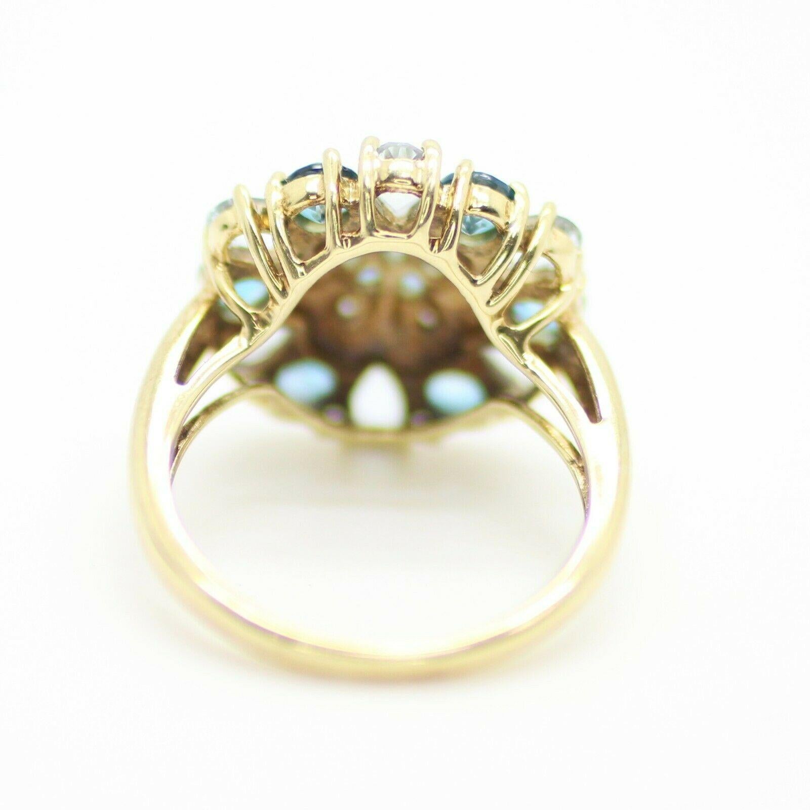 Contemporary 10 Karat Yellow Gold Topaz and Aquamarine Gemstones Ring