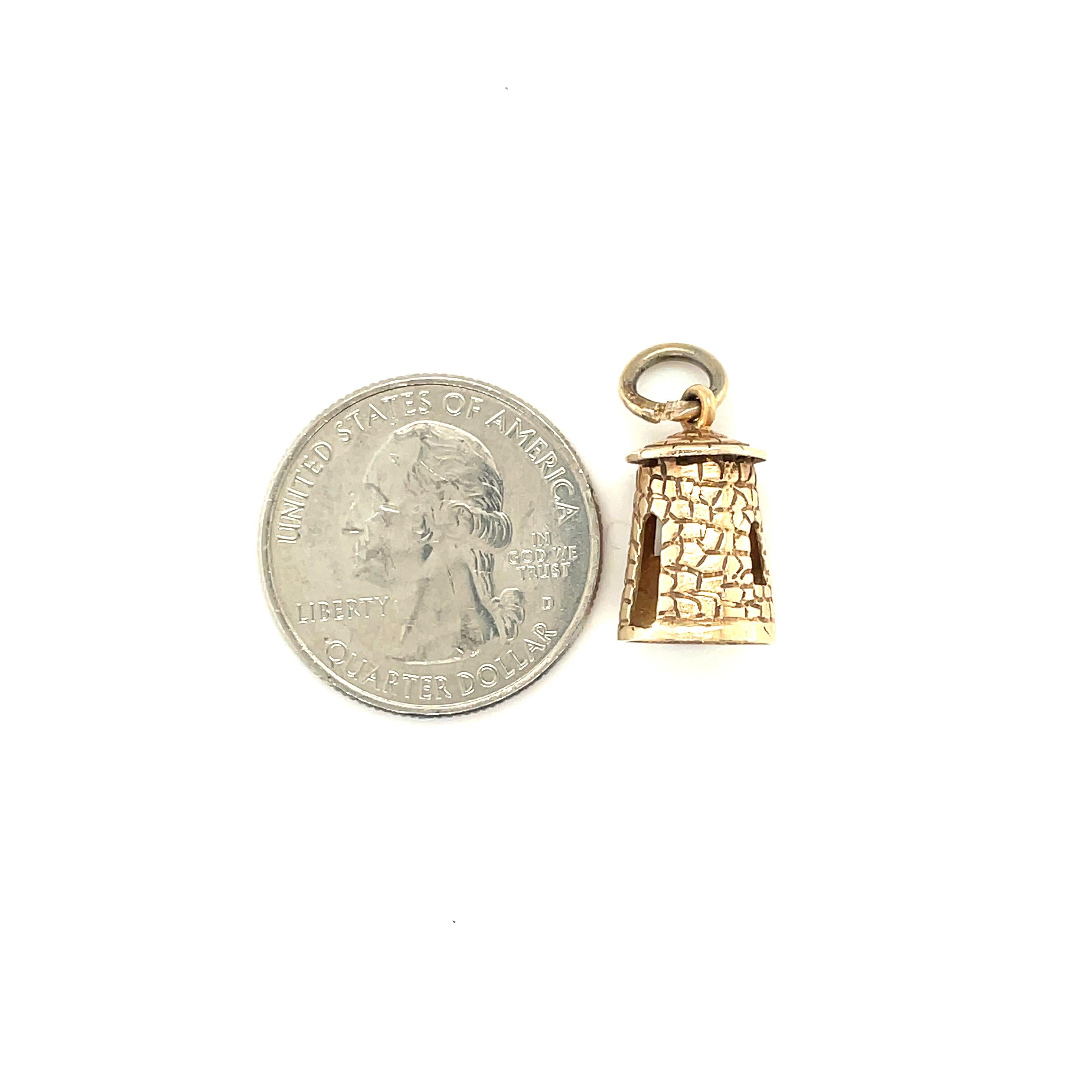 10K Yellow Gold Tower Charm

Grams 2.8