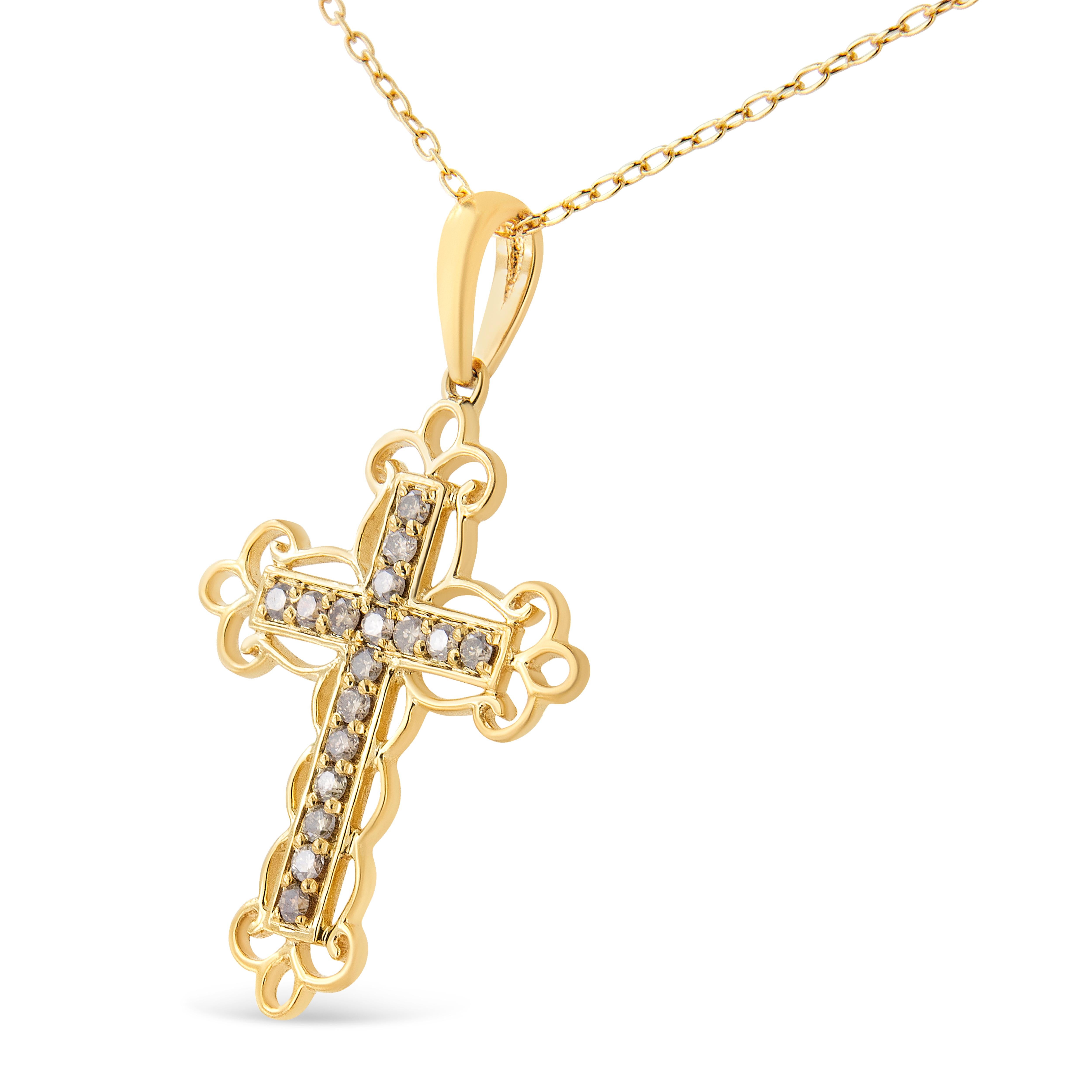 Embrace your spirituality with this unique, art-deco like filigree cross pendant. Elegant strands of 10kt yellow gold plated 925 sterling silver wrap around the cross motif in an elegant and intricate manner. This necklace is embellished with 17