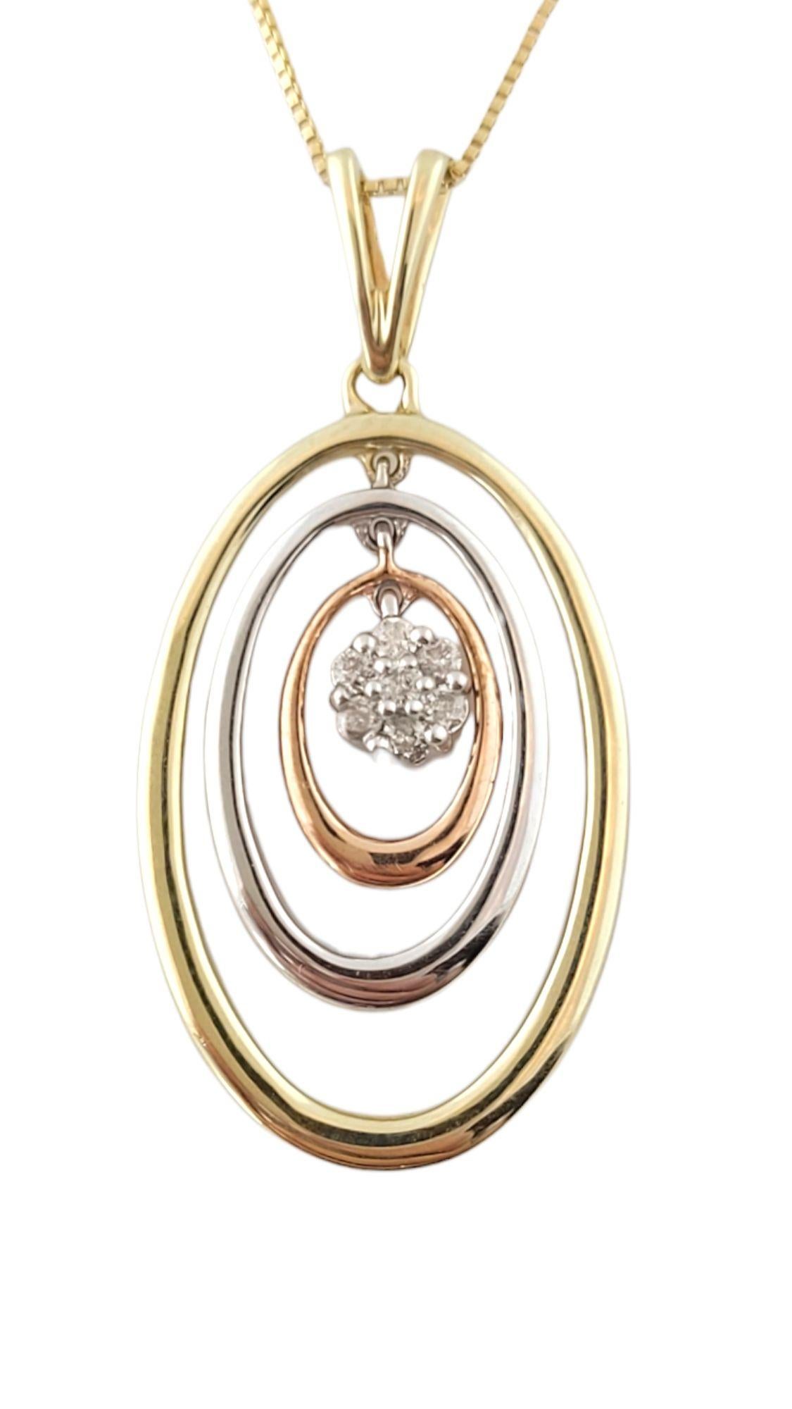 This gorgeous 10K gold pendant has a yellow, white, and rose gold oval all surrounding 7 sparkling round brilliant cut diamonds in the center! This piece is paired with a beautiful 10K yellow gold chain.

Total approximate diamond weight: 0.05