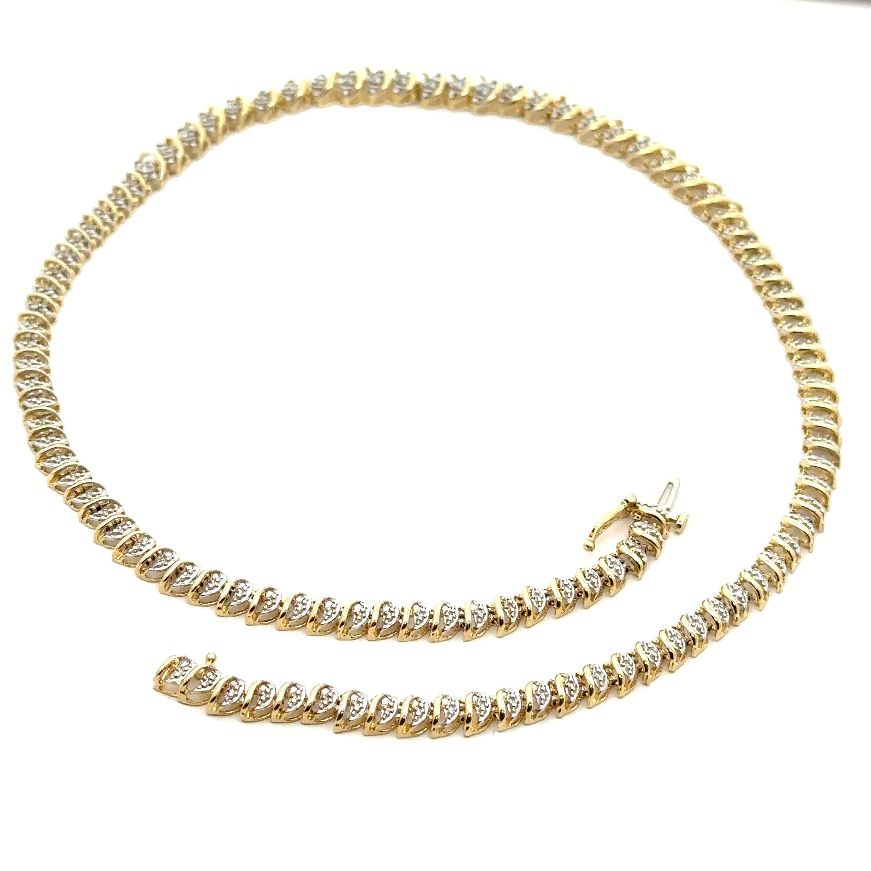 --Stone(s):--
Numerous Natural Genuine Diamonds - Round Brilliant Cut - Illusion Prong Set - Light Champagne Color - I1-I3 Clarity - 1.50ctw (approx.)

Material: 10K Solid Yellow Gold w/ White Gold Accents
Weight: 19.90 Grams
Chain Type: S Link