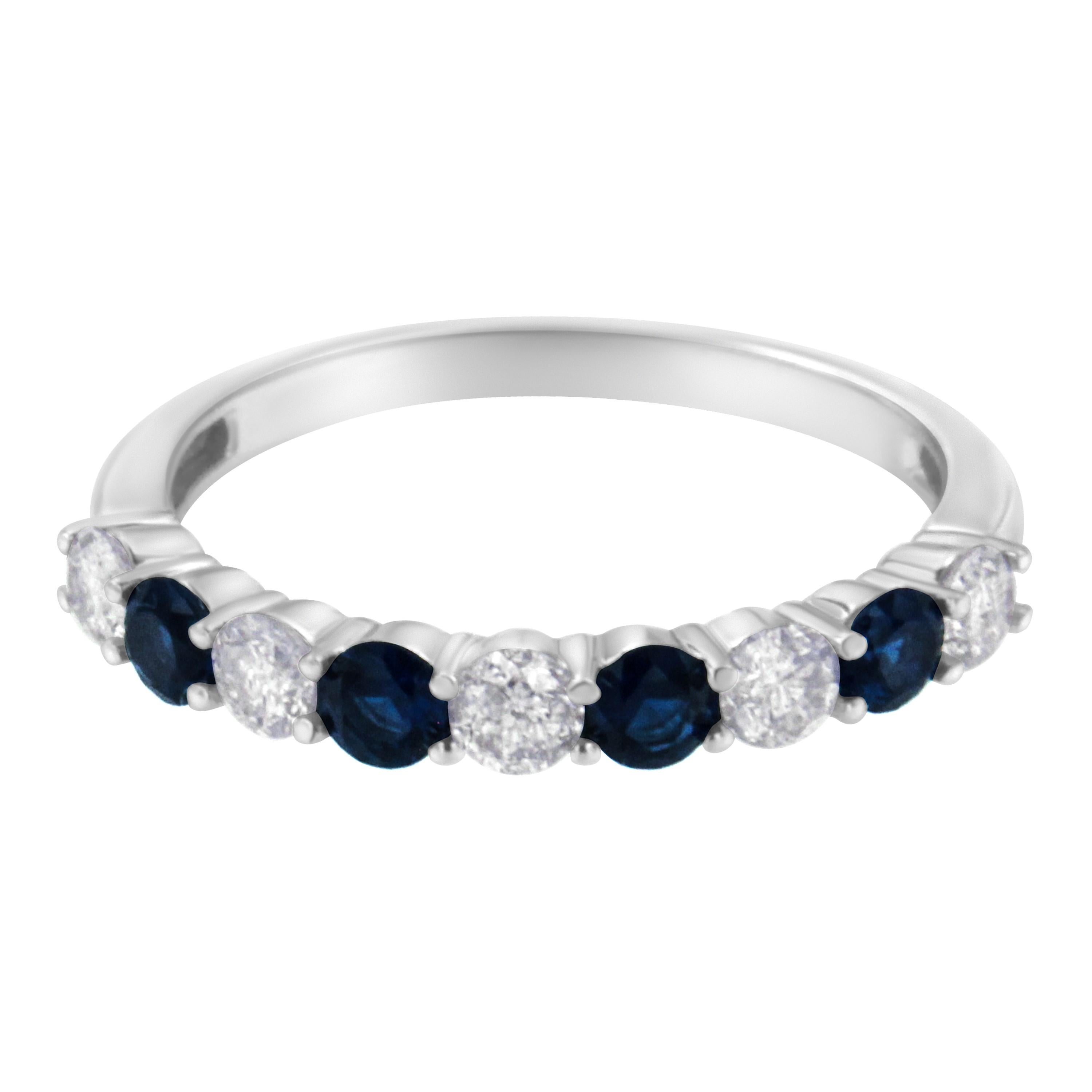 A radiant 10k white gold band is the perfect setting for this ring design. The half top of the shank is inlaid with five 1/2ct round cut diamonds that alternate with four 3/8ct lab created, deep blue round sapphires. A design that will last for