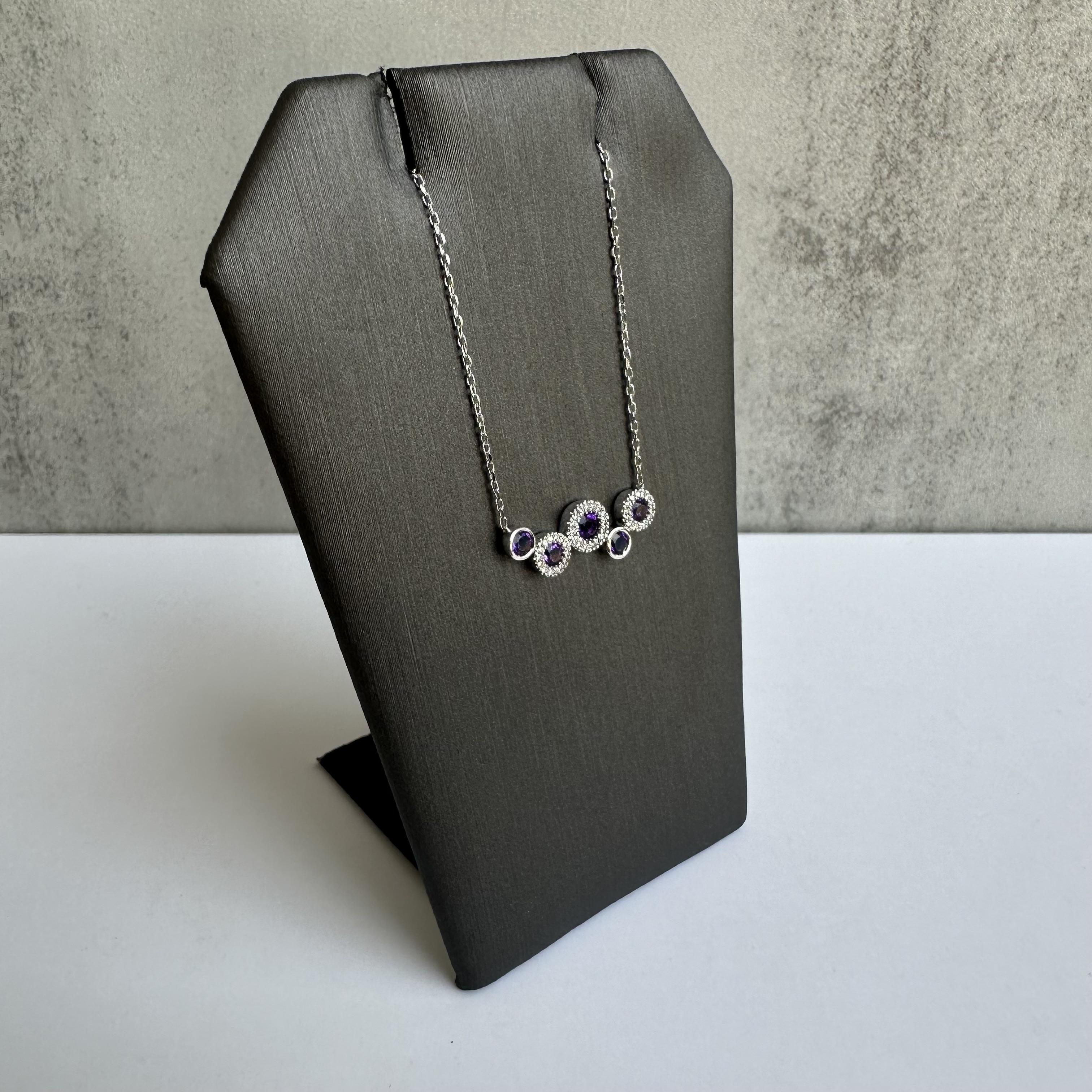 Enhance your jewelry collection with this exquisite 10kt White Gold Amethyst and Diamond Necklace. Featuring a 0.25ctw amethyst and 0.09ctw GH SI diamonds, this necklace combines timeless beauty with modern elegance, perfect for any