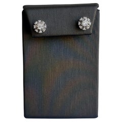 10kt White Gold Round and Baguette Cut Diamond Stud Earrings - 0.75ctw Diamonds