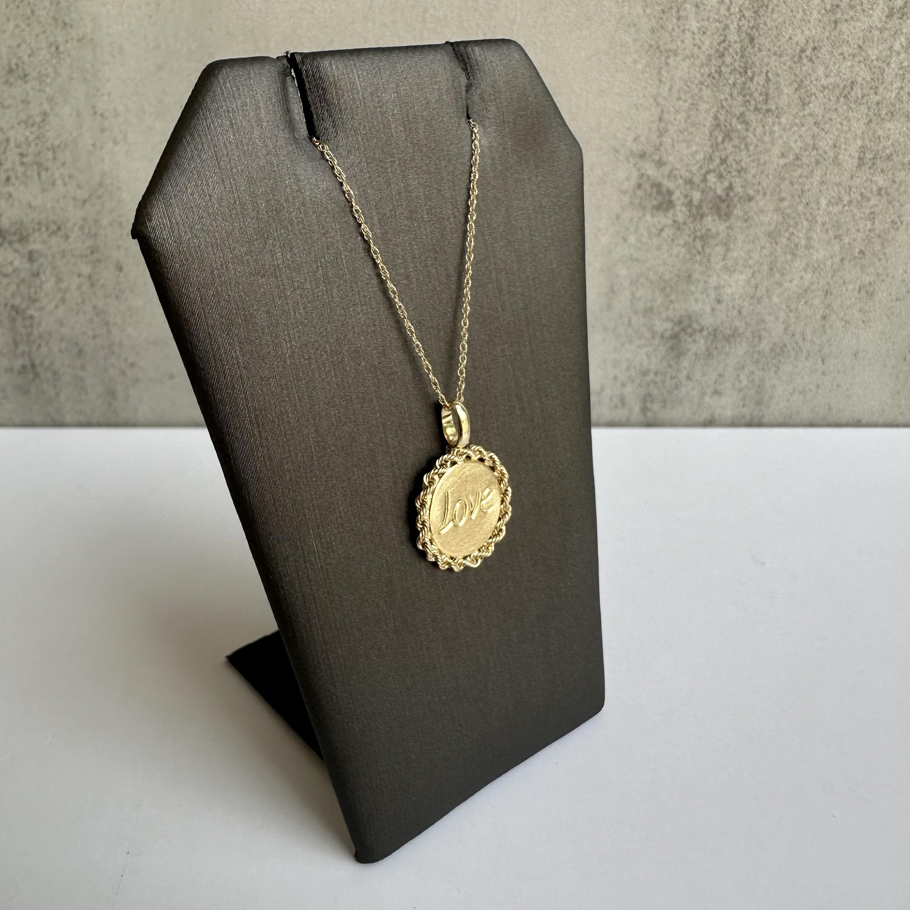 Express your affection with this exquisite 10kt Yellow Gold Engraved 