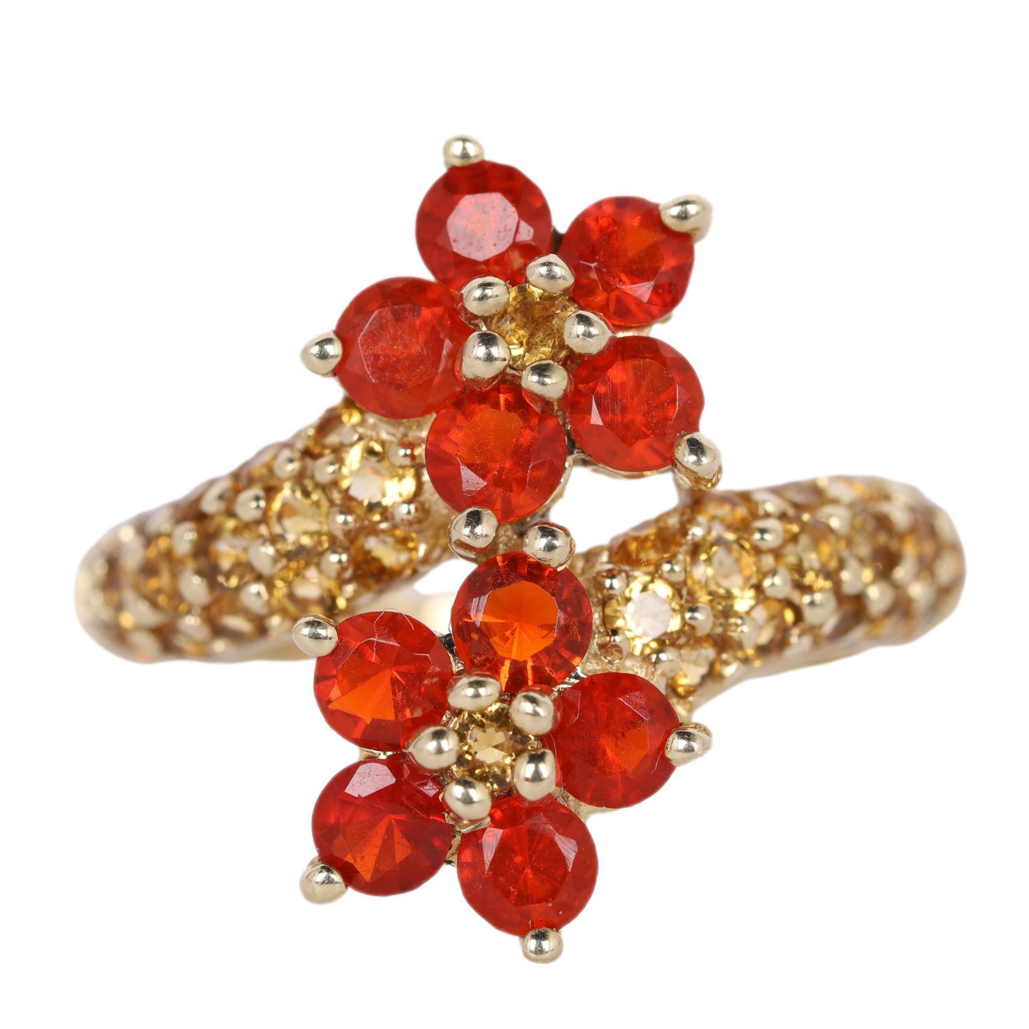 10Kt Yellow Gold Mexican Fire Opal and Citrine Double Flower Ring Size 6

The ring features 10 total Mexican fire opals, arranged in two flower settings. Each opal measures approximately 3mm in diameter. Along with these, there are 26 total round