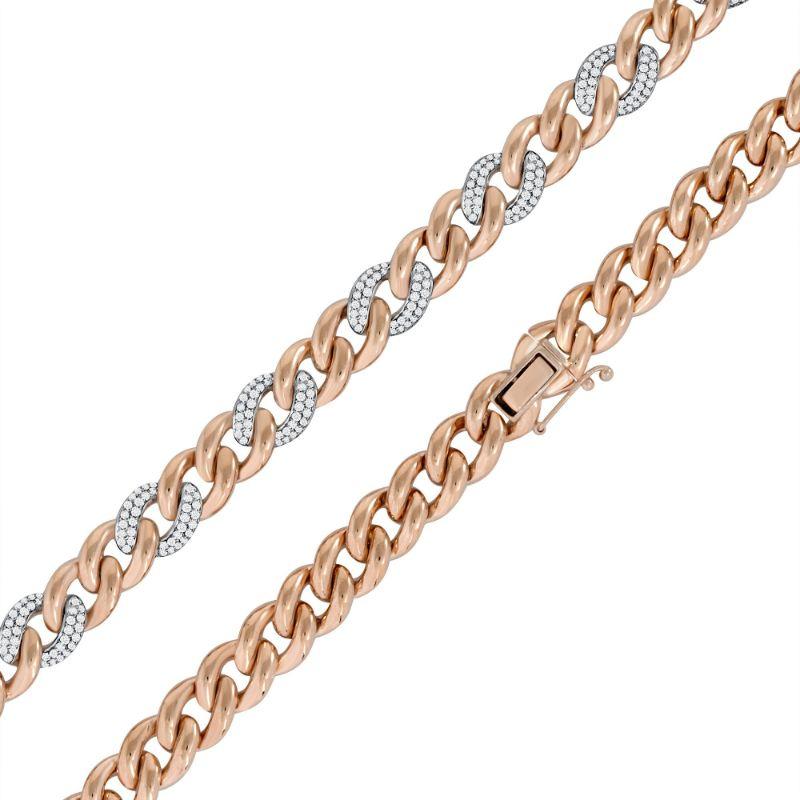 10mm Cuban Link Diamond Two-Tone 2 to 1 Chain Necklace in 18K Rose & White Gold

2.59 Cts of Diamonds, G-H Color, VS-SI Clarity
57.8 Grams of 18K Rose & White Gold
Length: 16 inches

No two products are exactly same, therefore weights are