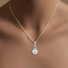 10mm Dangling Pearl Necklace with Diamond Accents .25cttw 14k Yellow Gold