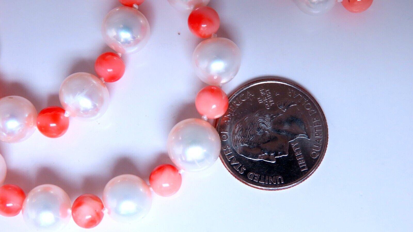 10mm Fresh Water Pearl Necklace.
Alternating with 7mm Coral Beads
14kt white gold Clasp
25 inches long
73 Grams