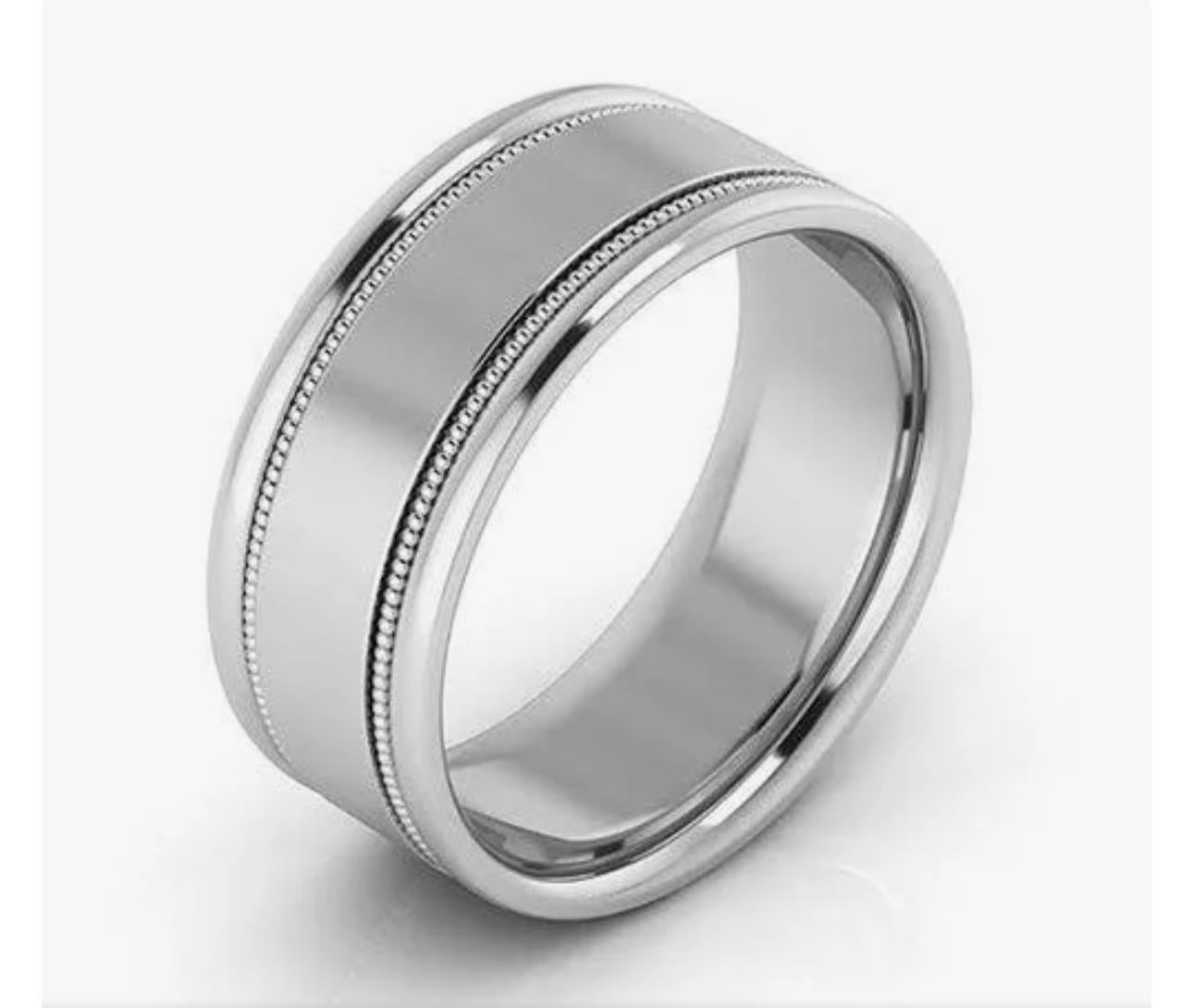 10MM WIDE MILGRAIN EDGE Platinum Plain Wedding Band Ring 24.2 Grams, COMFORT FIT
This men’s or unisex  wedding band, crafted in Platinum , measures 10 mm in width and  2.4 mm thickness is a size 11
 It weighs 24.2 grams.
Comfort fit with round