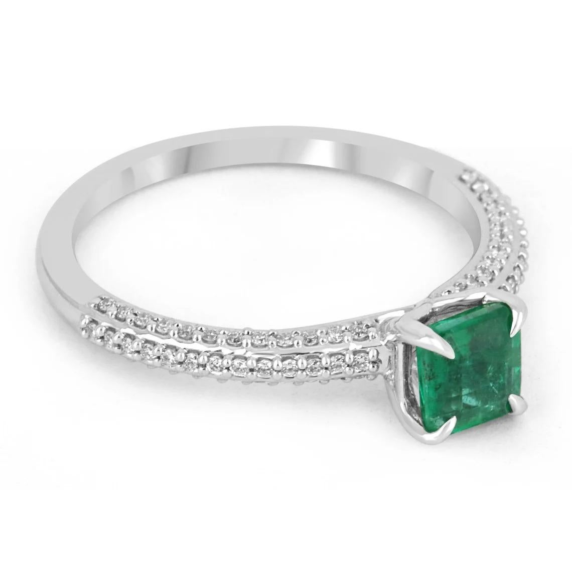 Elegantly displayed is a natural Asscher-cut emerald and diamond ring. The center gem is a beautiful quality, Asscher cut, emerald filled with life and brilliance! Among the emeralds, impressive qualities are their vibrant color and beautiful eye