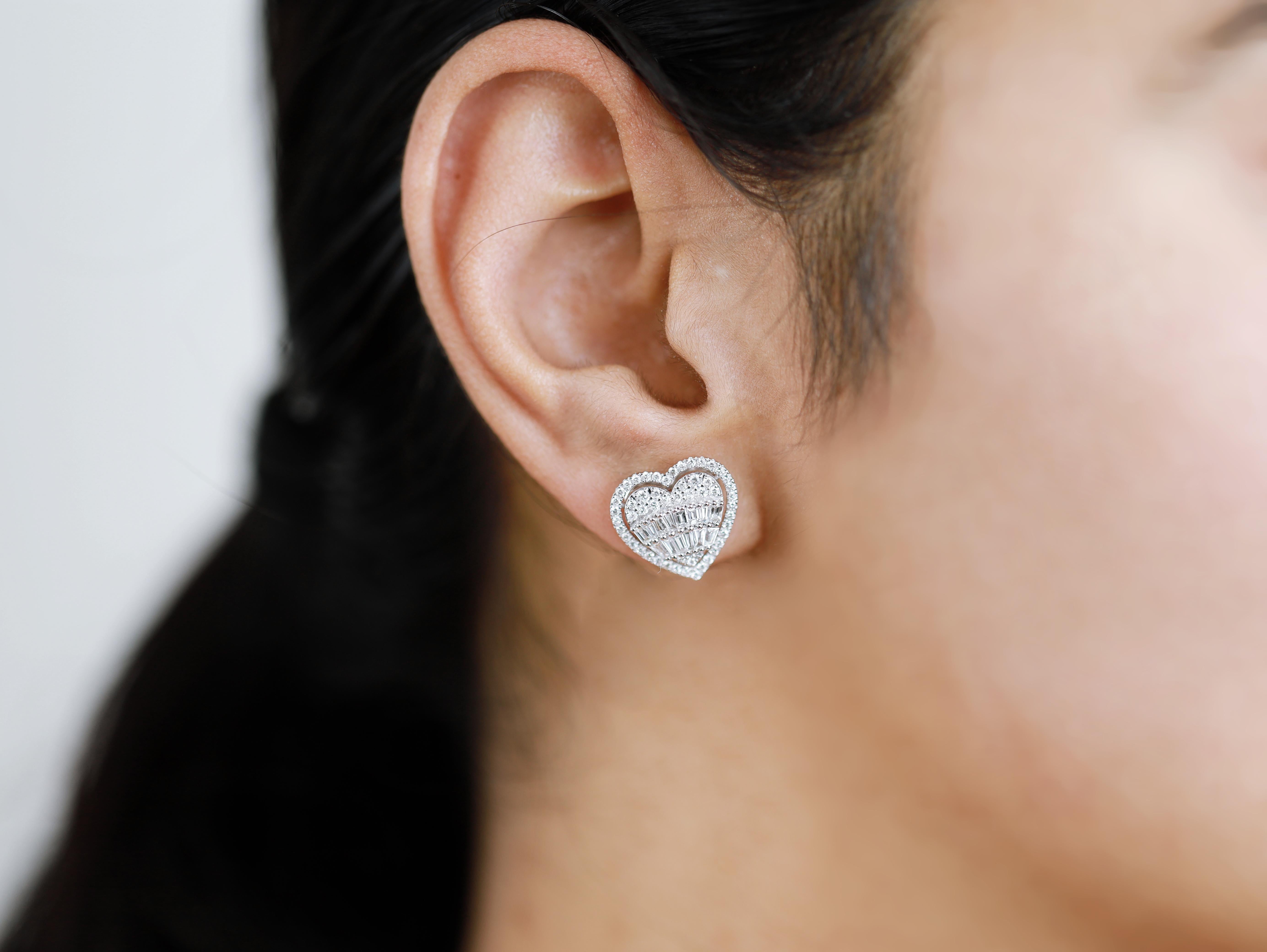 A refined tribute to the bold geometry and opulence of the Art Deco era, these halo stud earrings embody timeless sophistication and exquisite craftsmanship. Each pair is handcrafted in luminous 18K white gold, weighing approximately 5.5 grams, and