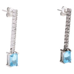 10W Diamond 
EC Blue Topaz Linear Drop Earrings