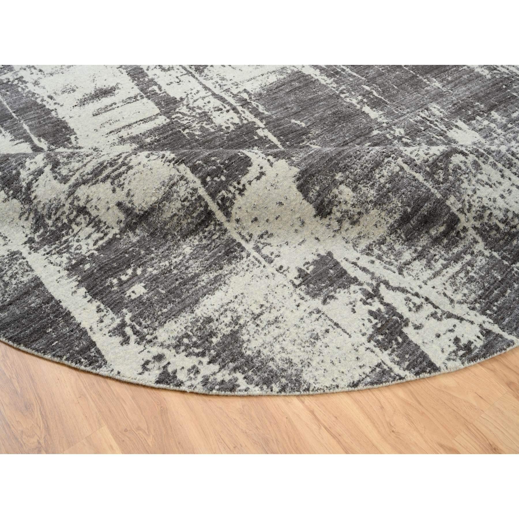 Alfombra redonda tejida a mano de lana y seda de diseño moderno negro 10'x10' Siglo XXI y contemporáneo en venta