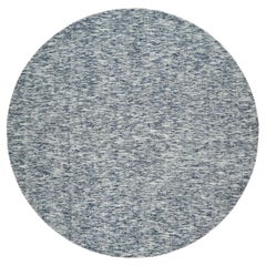 10
x10
 Tapis rond bleu et ivoire, pure laine, tissé à la main, design moderne à rayures