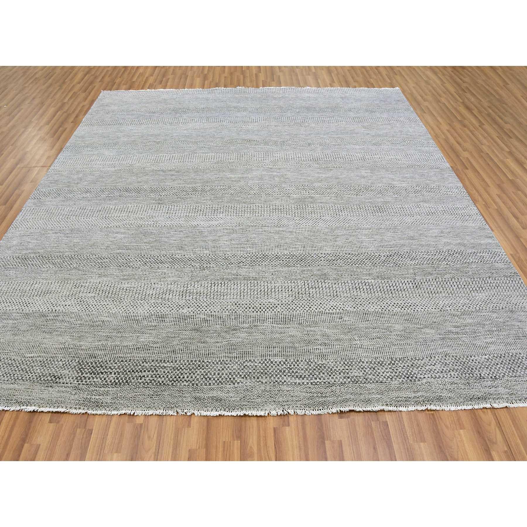 This is a truly genuine one-of-a-kind Undyed 100% Wool, Tone on Tone, Modern Grass Design, Hand Knotted, Oriental Rug. It has been Knotted for months and months in the centuries-old weaving craftsmanship techniques by artisans.
Primary materials: