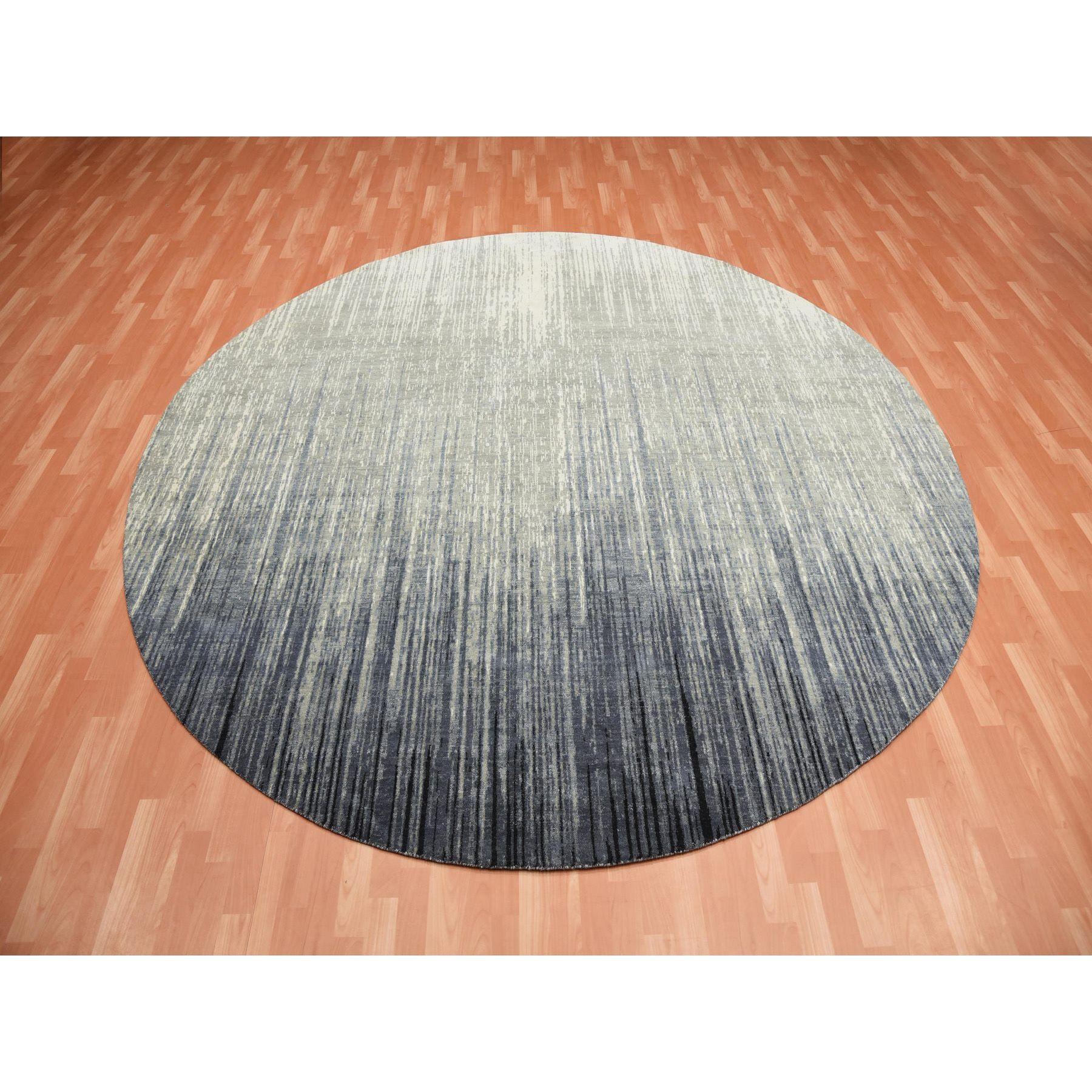 This is a truly genuine one-of-a-kind Gray and Black, Modern Ombre Design Densely Woven, Organic Wool Hand Knotted, Round Oriental Rug.  It has been Knotted for months and months in the centuries-old weaving craftsmanship techniques by expert