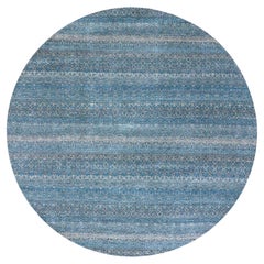 10
x10
 Hyperlink Blue Tapis Kohinoor en laine ton sur ton, noué à la main, doux et brillant