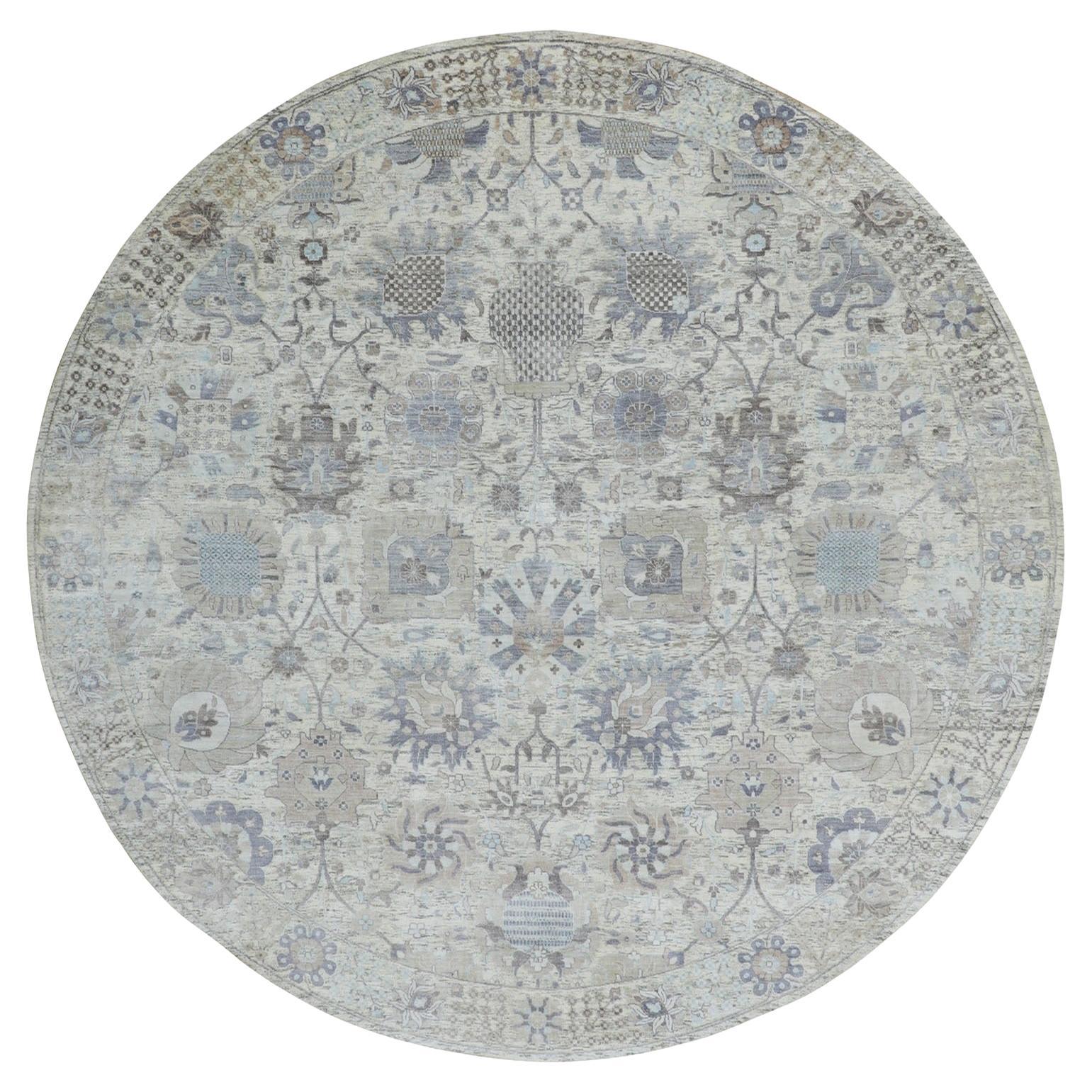 Tappeto orientale Tabriz 10
x10
rotondo in seta avorio con lana testurizzata annodato a mano