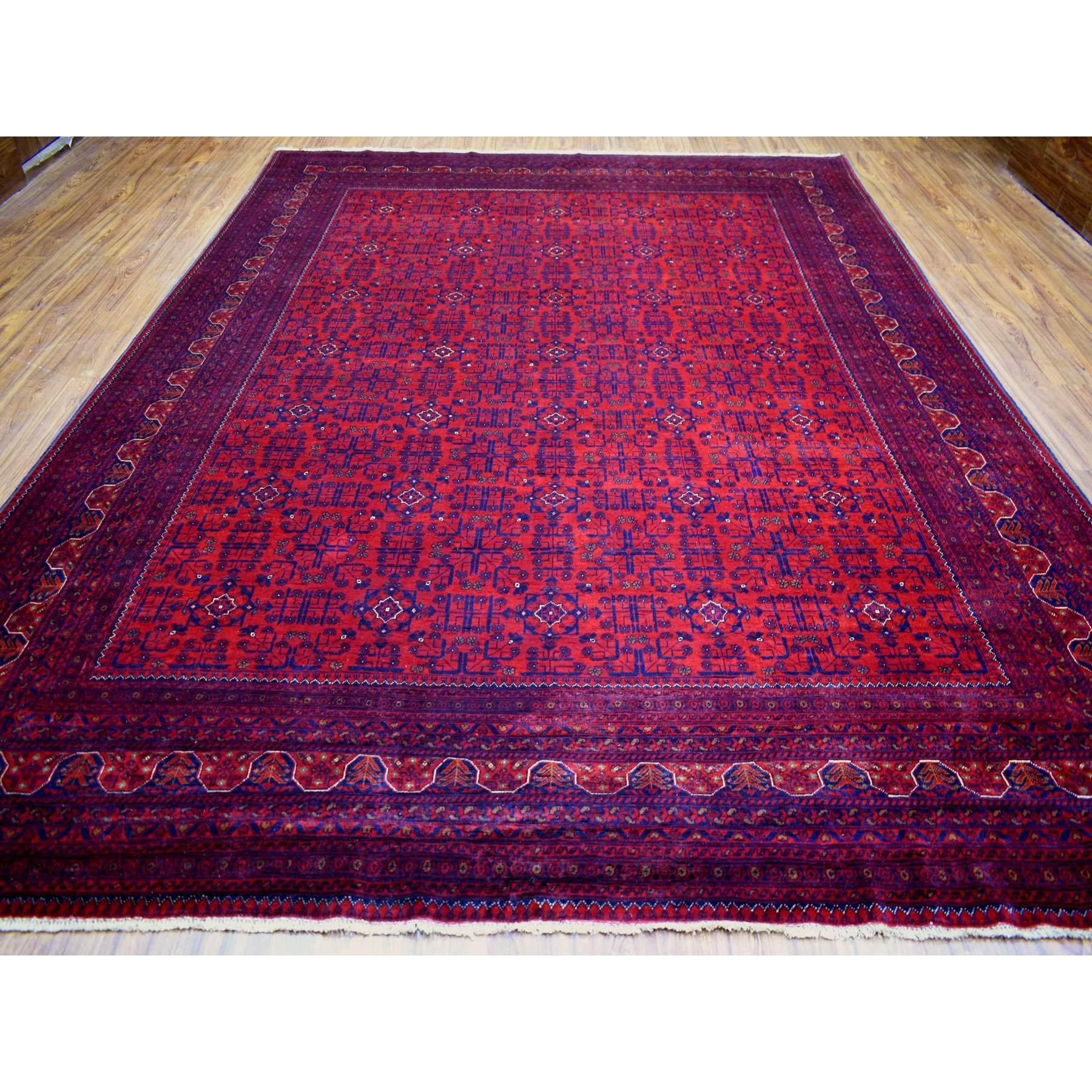 This is a truly genuine one-of-a-kind Red Hand Knotted Soft Shiny Wool Afghan Khamyab Geometric Design Rug. It has been Knotted for months and months in the centuries-old weaving craftsmanship techniques by expert artisans.
Primary materials: