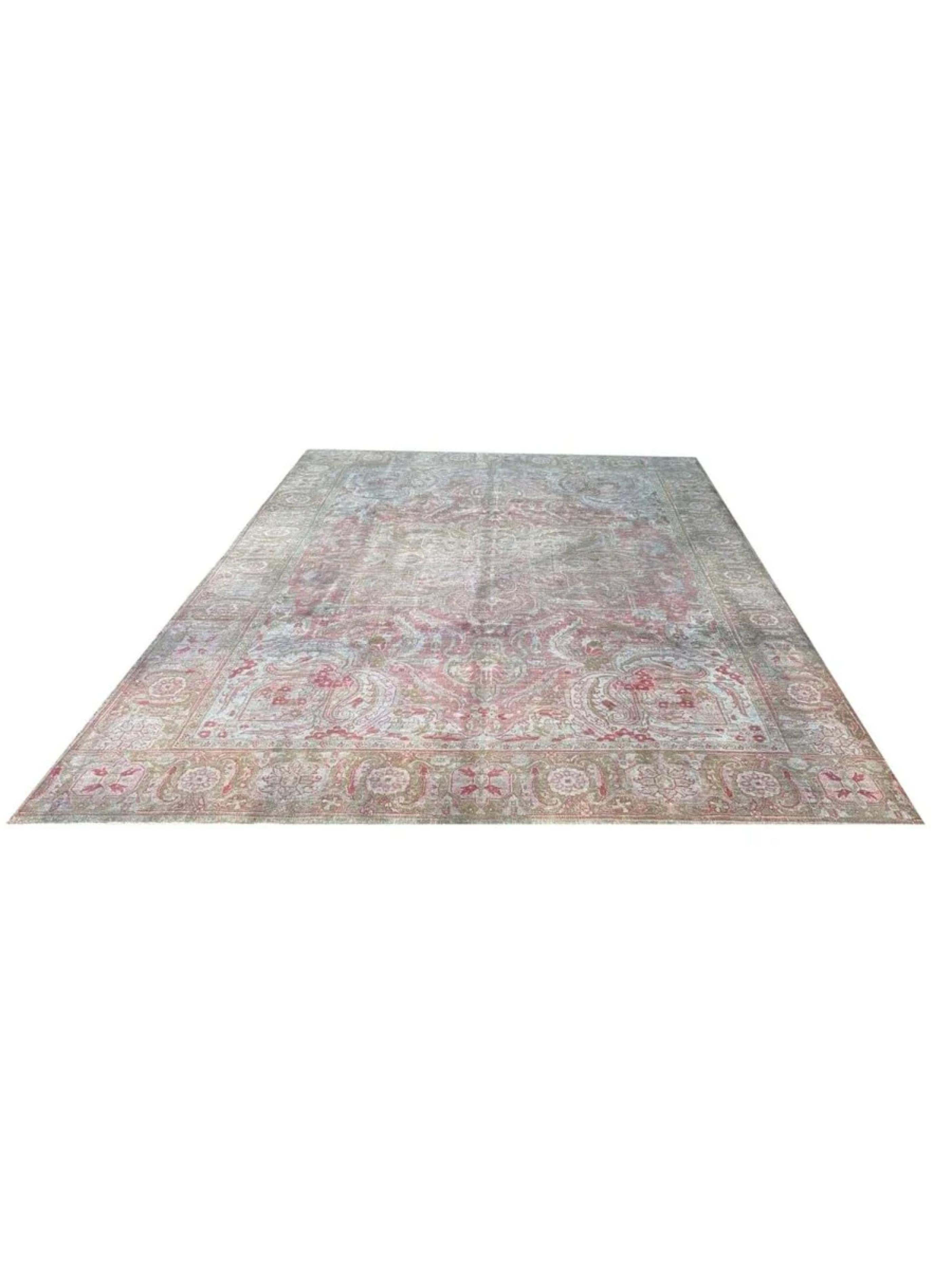 Hand-knotted in, this stunning 10x13 Heriz area rug brings timeless elegance and sophistication to any interior. Its detailed central medallion, surrounded by intricate floral motifs, showcases the artistry. The design harmoniously blends soft red,