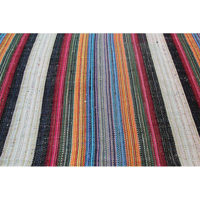 10x13 flatweave Persian Kilim Rug – This fun rug is a beautiful flat weave Persian Kilim rug featuring a vibrant alternating multi-colored stripes design. The lightweight construction makes this rug an excellent choice for a day at the beach or even
