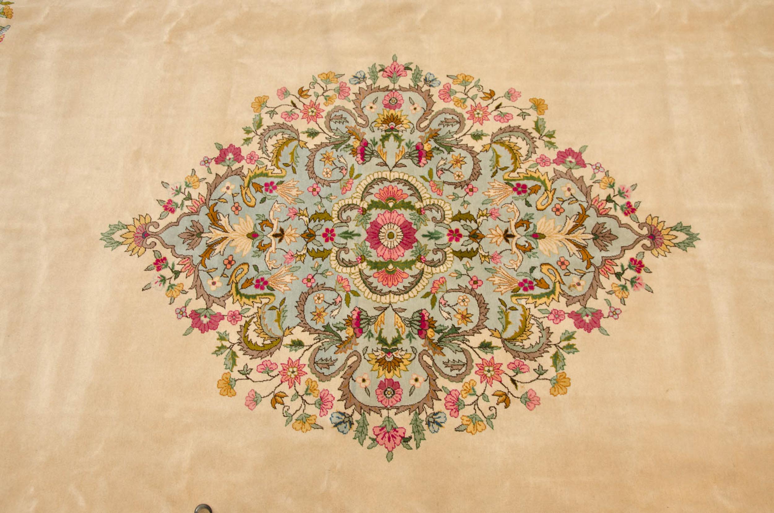:: Center medallion with ornate densely ornamented enveloped floral buds and blossoms atop an open field with corner spandrel floral sprays inwardly reconciled. Wrapped by a floating inner field overlay in Rococo stylized ribboned and scrolling
