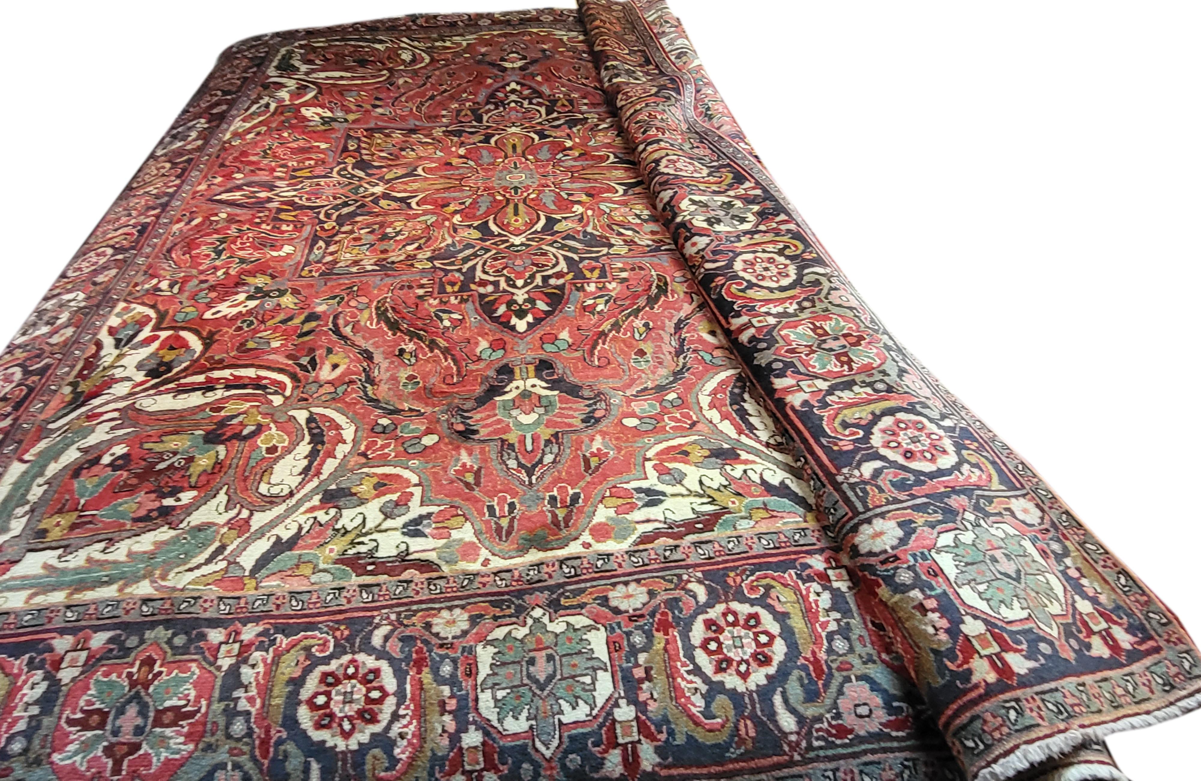 Incredible 50's authentic Persian Heriz. Heriz's are the most popular Persian rug in the world and with that we aim to offer a variety of harder to find, more exclusive designs. All of our Heriz's are authentic and hand woven in Iran. This Heriz