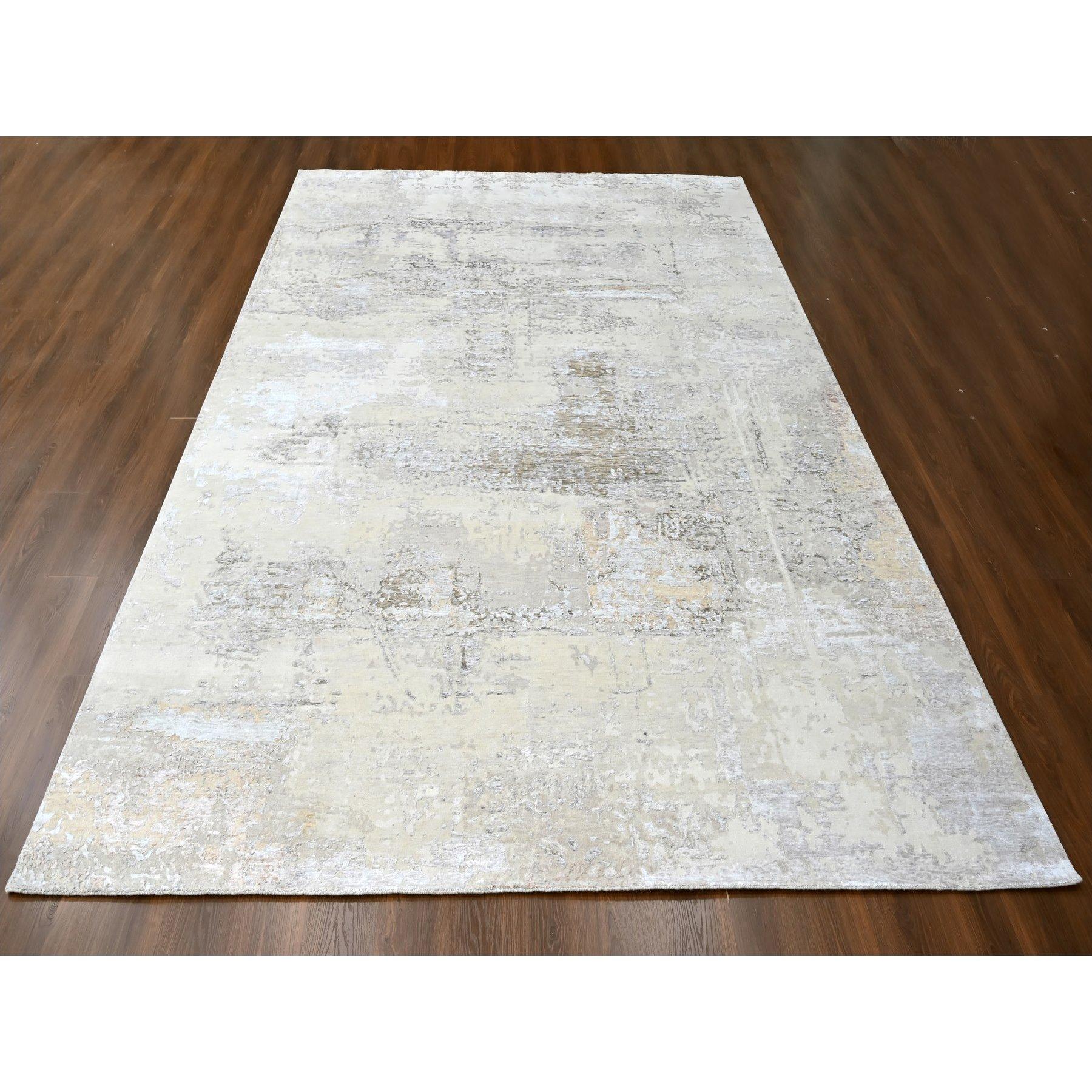 Oyster Gray with Soft and Cozy Color Shades, Abstract Design, Wool and Plant Based Silk, Hand Knotted, Nepali Weave, Modern, Oriental Rug
Primary materials: Wool & Silk
Latex: No Pile 
height: 0.25 Inches
Style: Contemporary
Primary color: