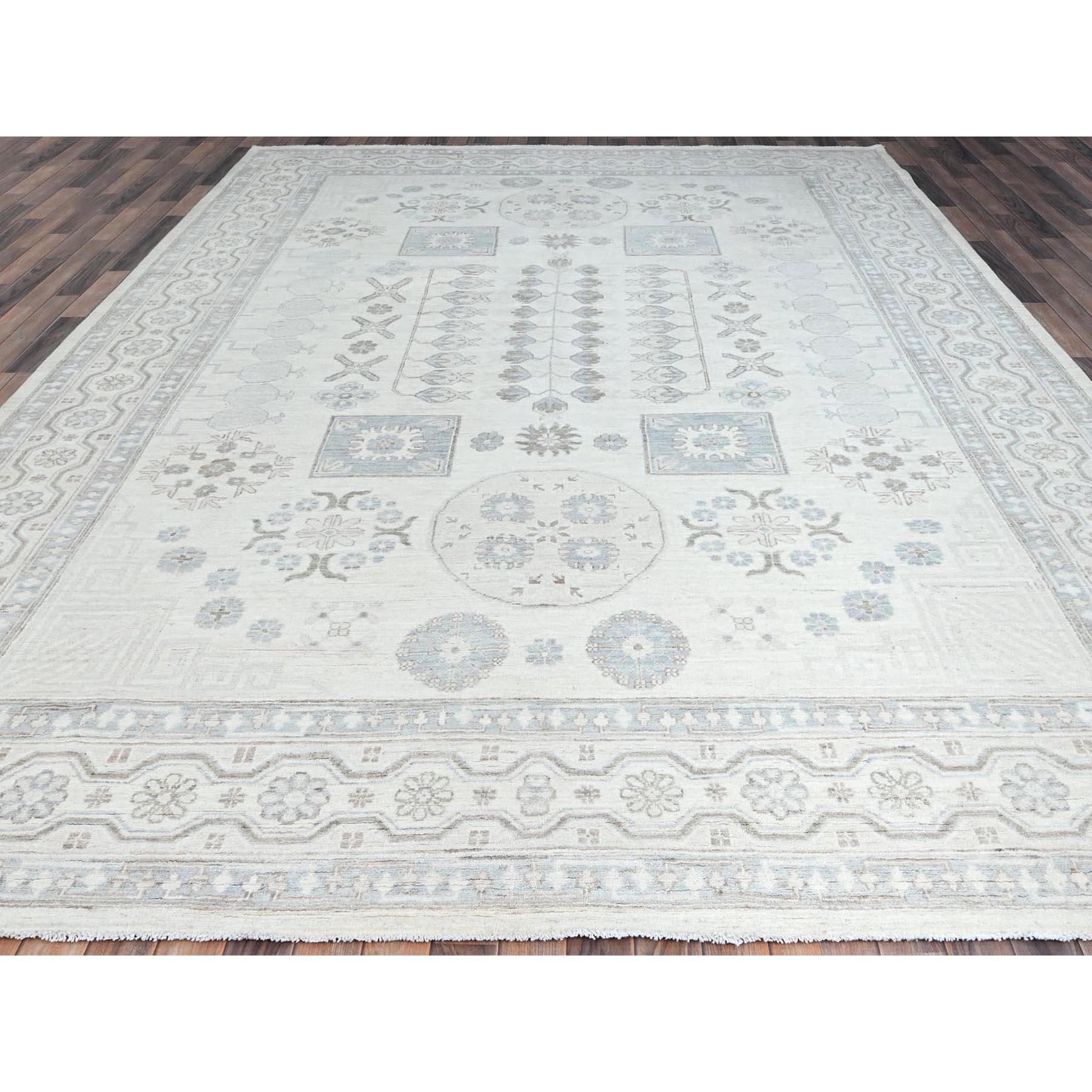 This is a truly genuine one-of-a-kind White Wash Peshawar with All Over Khotan Repetitive Flower Design, Hand Knotted, Pure Wool, Oriental Rug. It has been Knotted for months and months in the centuries-old weaving craftsmanship techniques by expert