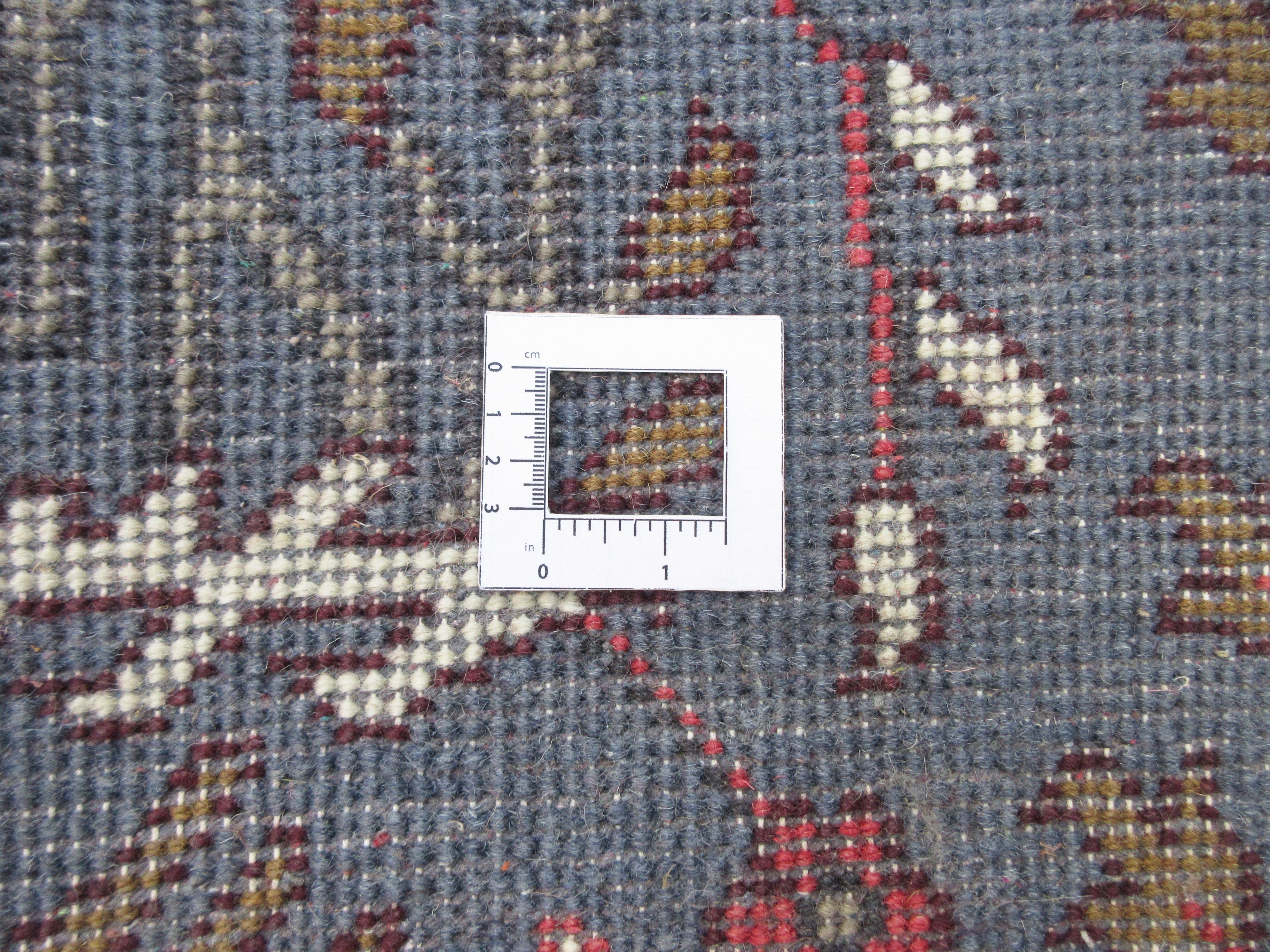Blauer Vogel Designteppich im Angebot 1