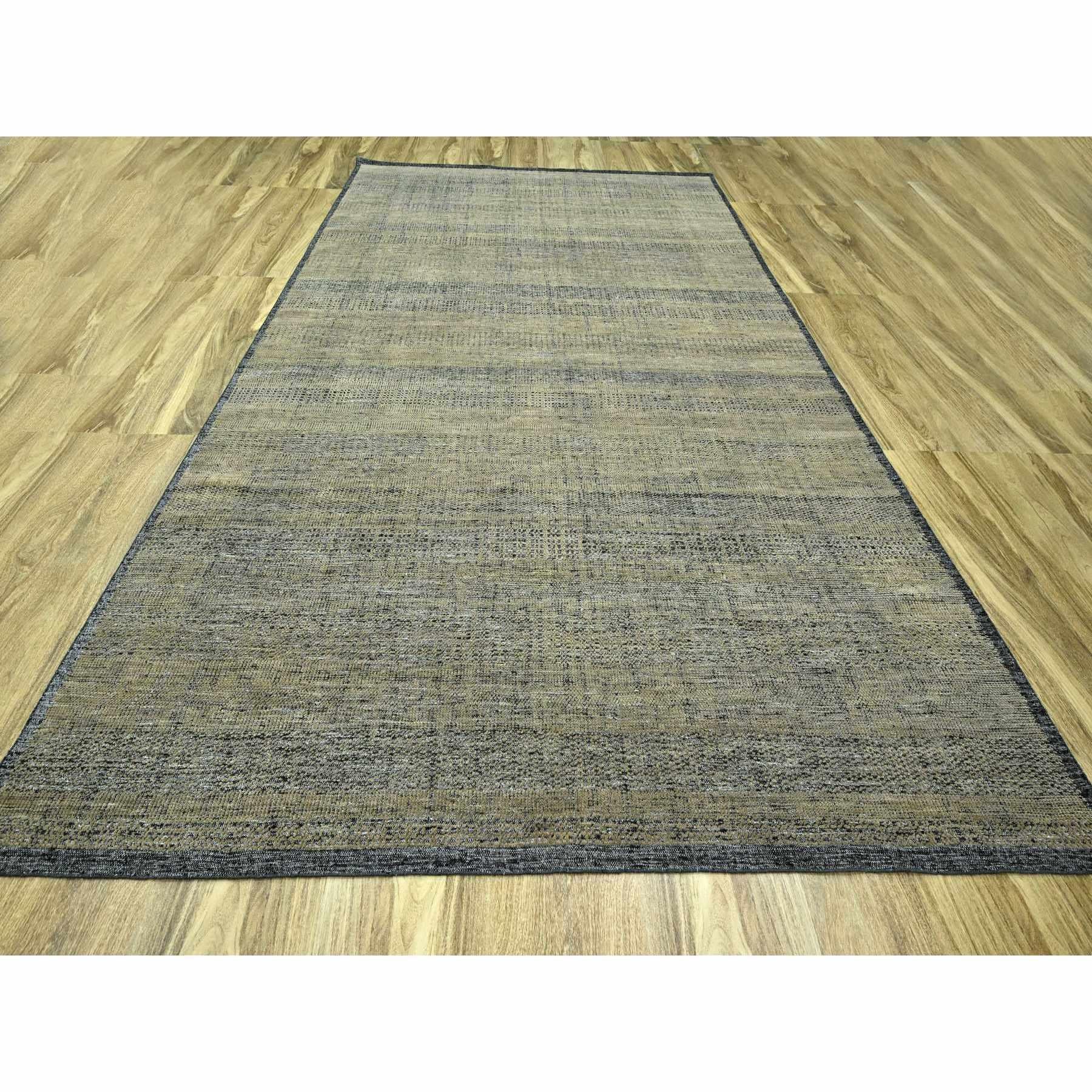 Marrón hueso con negro carbón, diseño de hierba oxidada y desgastada con urdimbres expuestas, anudada a mano, pura lana, alfombra oriental
Materiales primarios: Lana
Látex: Sin pelo 
altura: 0,25 Pulgadas
Estilo: Contemporáneo
Color principal: