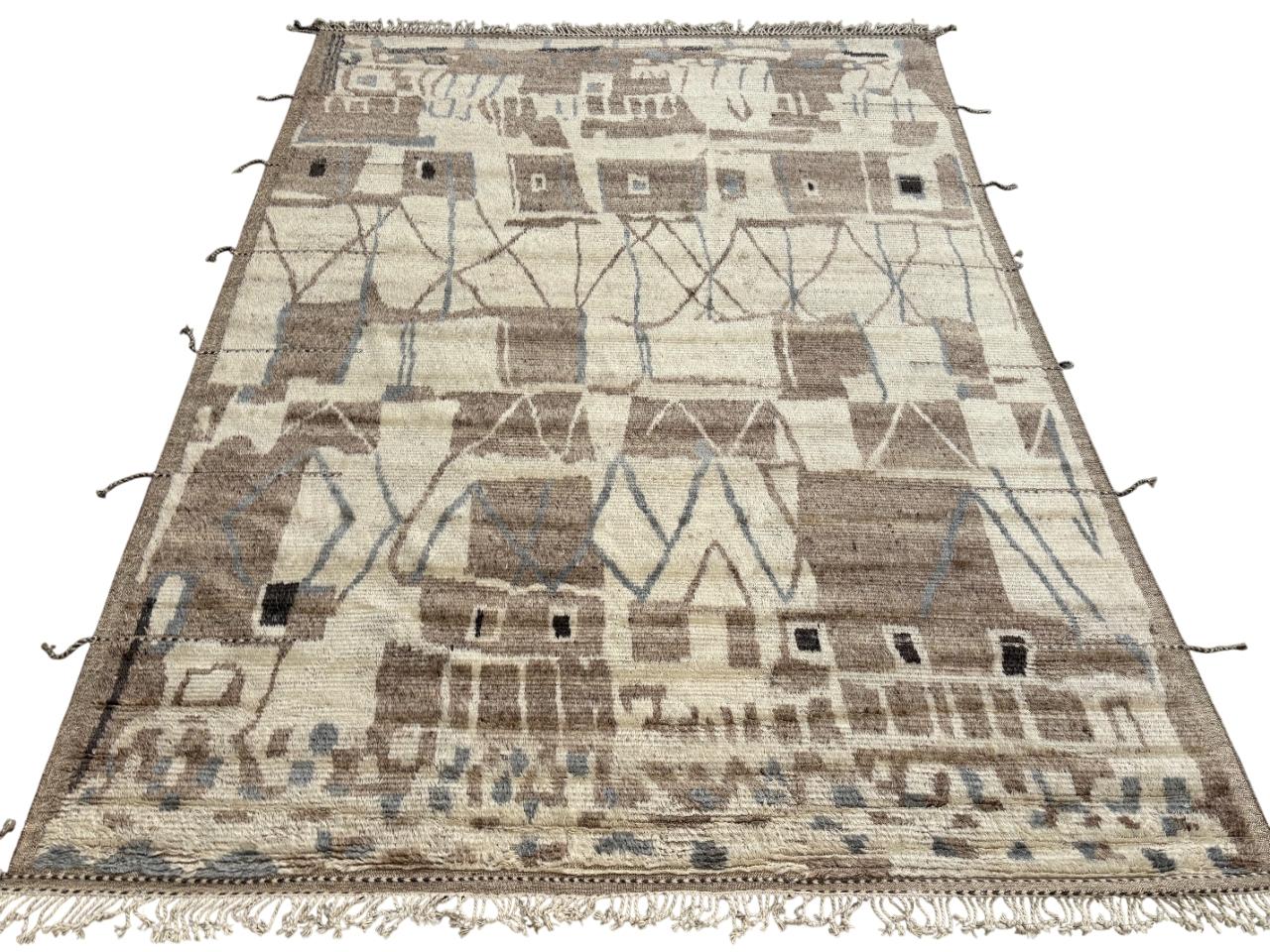 Elevate your living space with the exquisite charm of this new modern hand-knotted Moroccan berber beni ourain rug, crafted with precision and care from 100% wool. Combining the allure of Moroccan design with contemporary sensibilities, this rug is