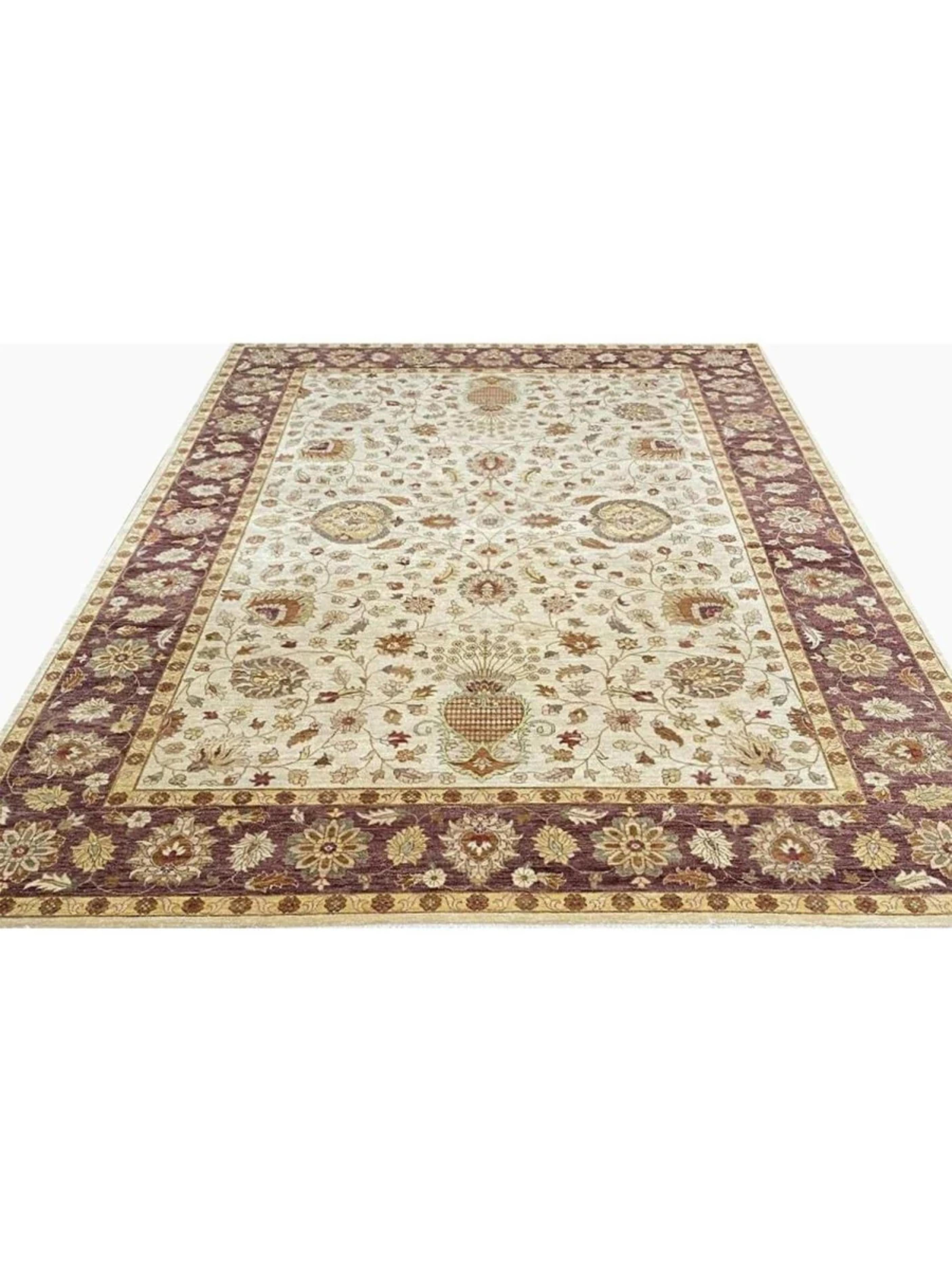 Upgrade your space with the timeless elegance of this 10x14 handwoven Indian Agra Area Rug, a stunning example of India’s rich weaving heritage. Expertly crafted by skilled artisans, this rug showcases a beautifully balanced geometric pattern filled