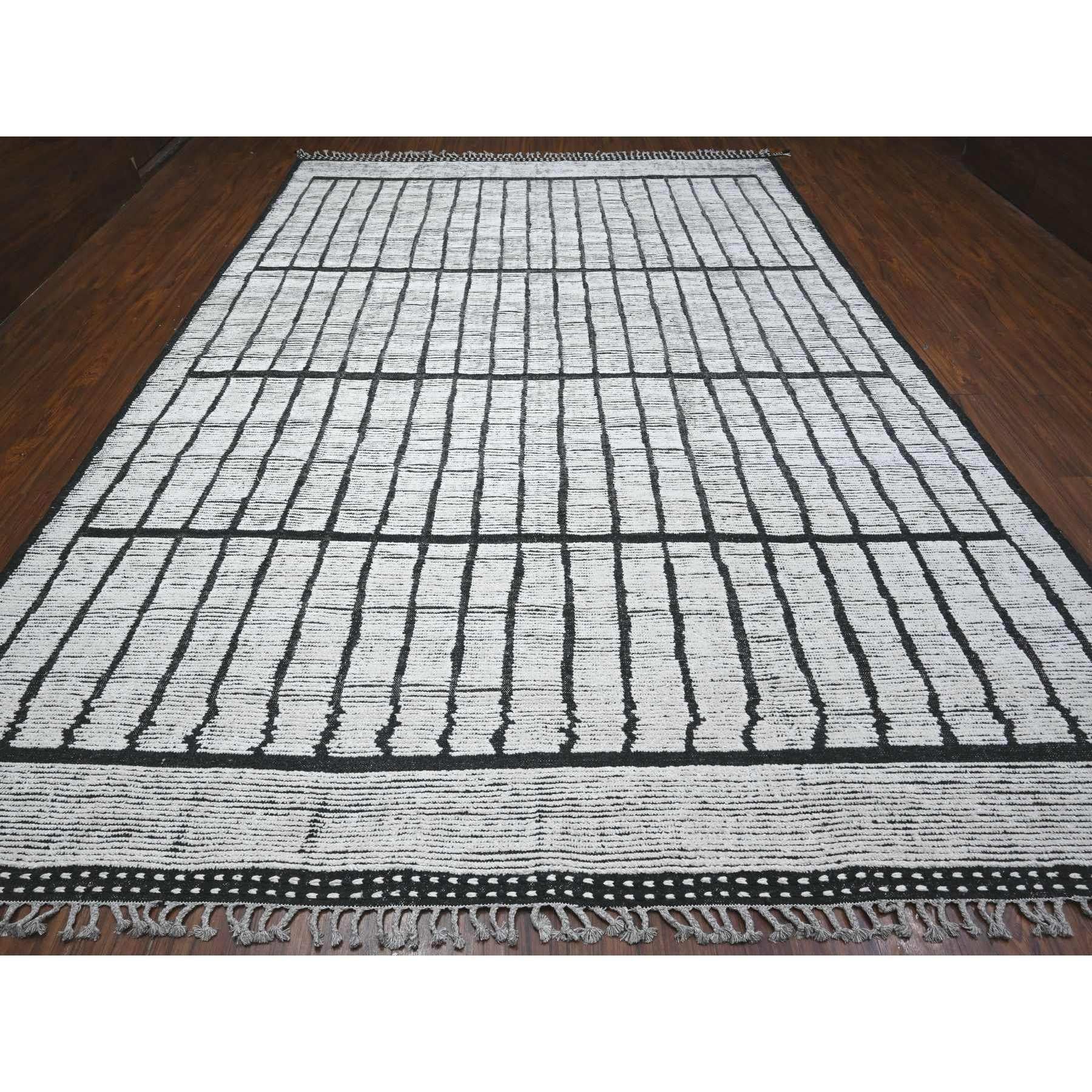 This is a truly genuine one-of-a-kind Moroccan Weave, Hand Knotted, Pure Wool, Oriental Rug. It has been Knotted for months and months in the centuries-old weaving craftsmanship techniques by expert artisans.
Primary materials: Wool
Latex: No Pile