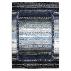 10
x14
 Kashkuli Gabbeh Soft Vibrant Wool Hand Knotted Black Oriental Rug