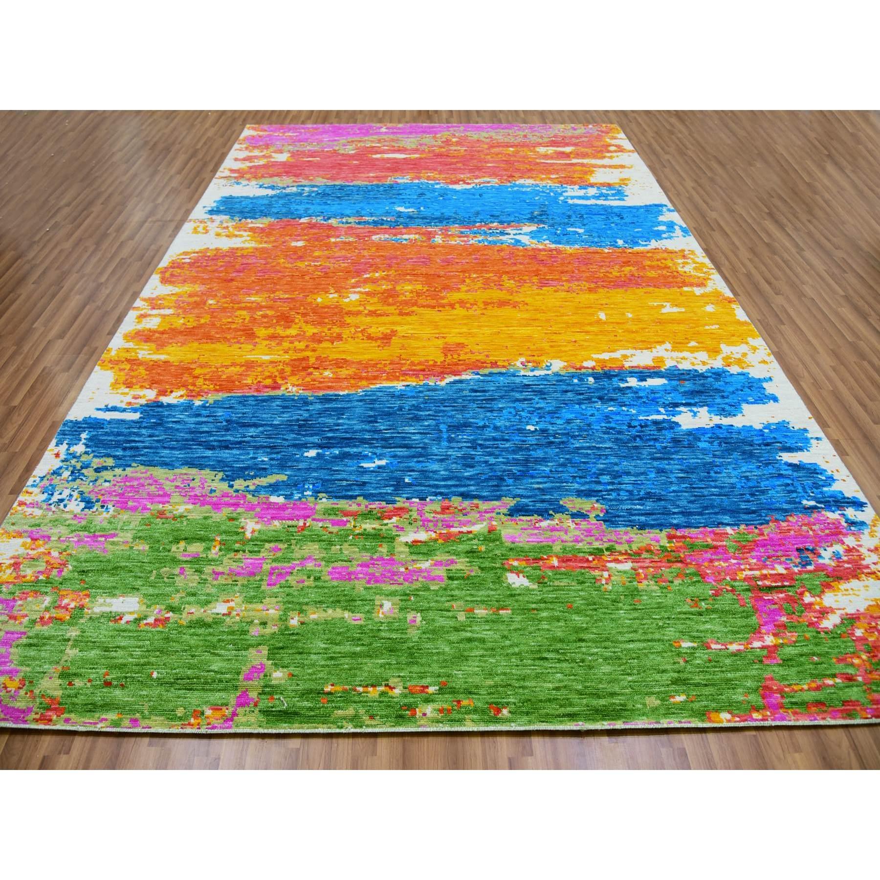 Ivory with Multi Beach Colors, Hand Knotted, Modern Abstract Design, Pure Wool, Lush and Plush, Oriental Rug
Primary materials: Wool
Latex: No Pile 
height: 0.25 Inches
Style: Contemporary
Primary color: Multi
Secondary colors: Red, Tangerine, Blue,