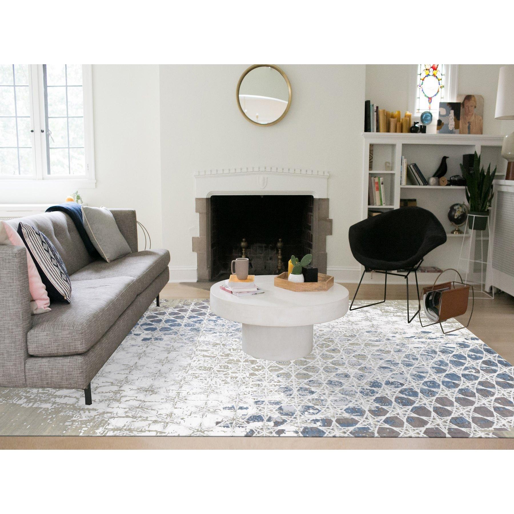 Agreeable Gray, THE HONEYCOMB Award Winning Design, Hand Knotted Wool and Silk, Oriental Rug
Primary materials: Wool & Silk
Latex: No Pile 
height: 0.25 Inches
Style: Transitional
Primary color: Grey
Secondary colors: Ivory, Blue, Dorian
