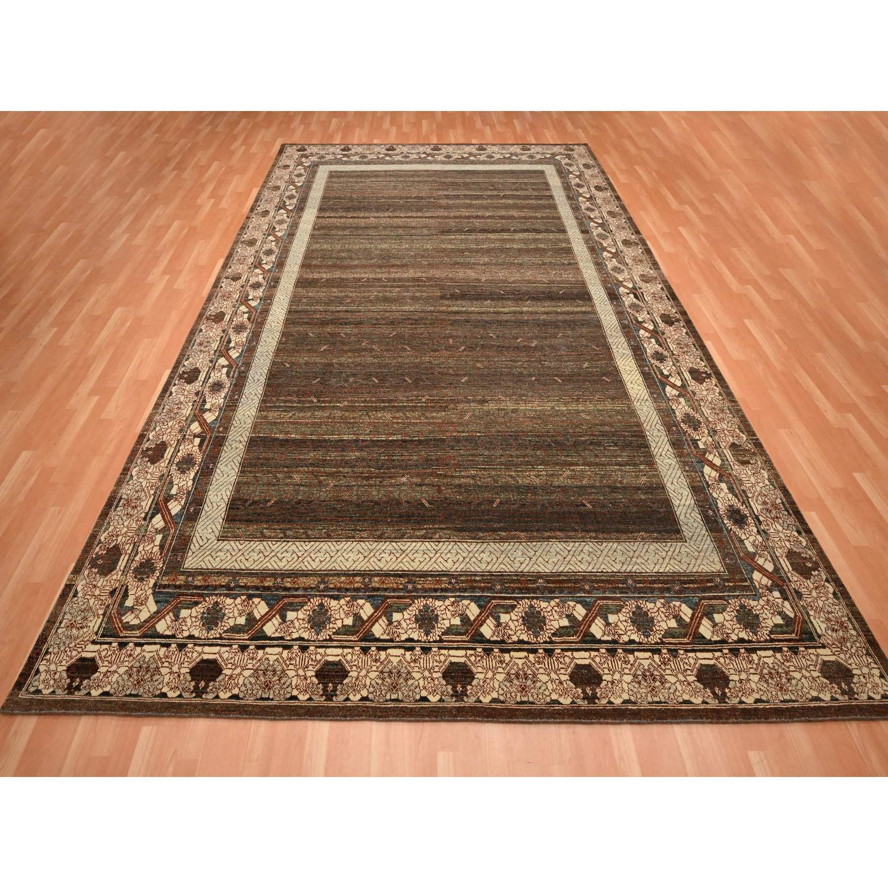 Schattierungen von Braun, Khotan Einfluss All Over Kompliziertes Design, Null Flor, 100% Wolle, Handgeknüpft, Orientteppich
Primäre MATERIALIEN: Wolle
Latex: Kein Flor 
Höhe: 0,25 Zoll
Stil: Traditionell 
Grundfarbe: Braun
Sekundäre Farben: Grün,