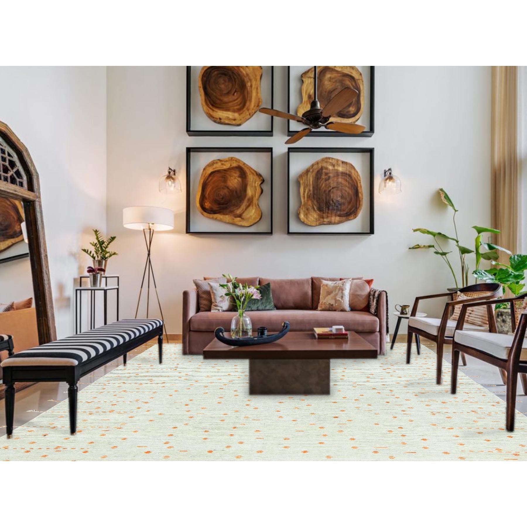 Pearl Ivory, Ben Ourain Moroccan Berber Influence Design, Natural Dyes, Organic Wool, Hand Knotted Oriental Rug
Primary materials: Wool
Latex: No Pile 
height: 0.25 Inches
Style: Traditional
Primary color: Ivory
Secondary colors: Orange, Ivory,