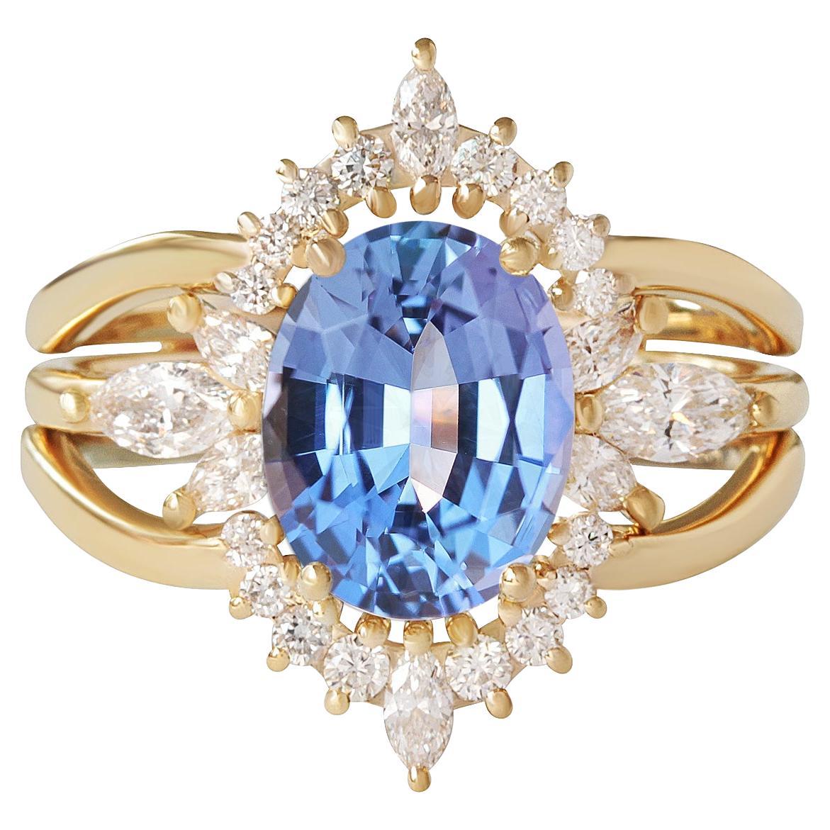 For Sale:  10X8mm Oval Tanzanite, Diamond Engagement Ringת Ring Guard. Jordan Athena Armour